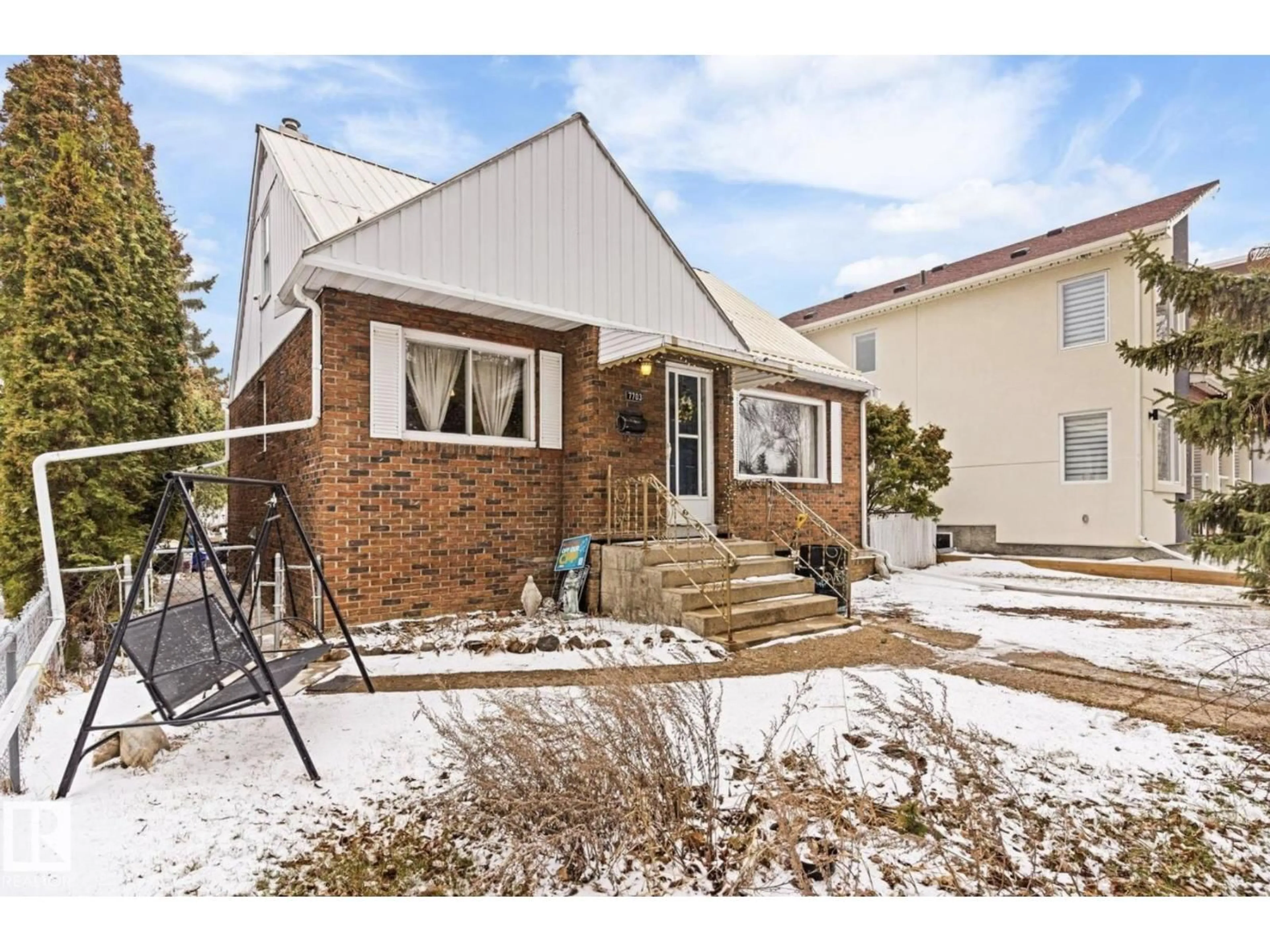 Home with brick exterior material, street for NW - 7703 77 AVENUE, Edmonton Alberta T6C0K6