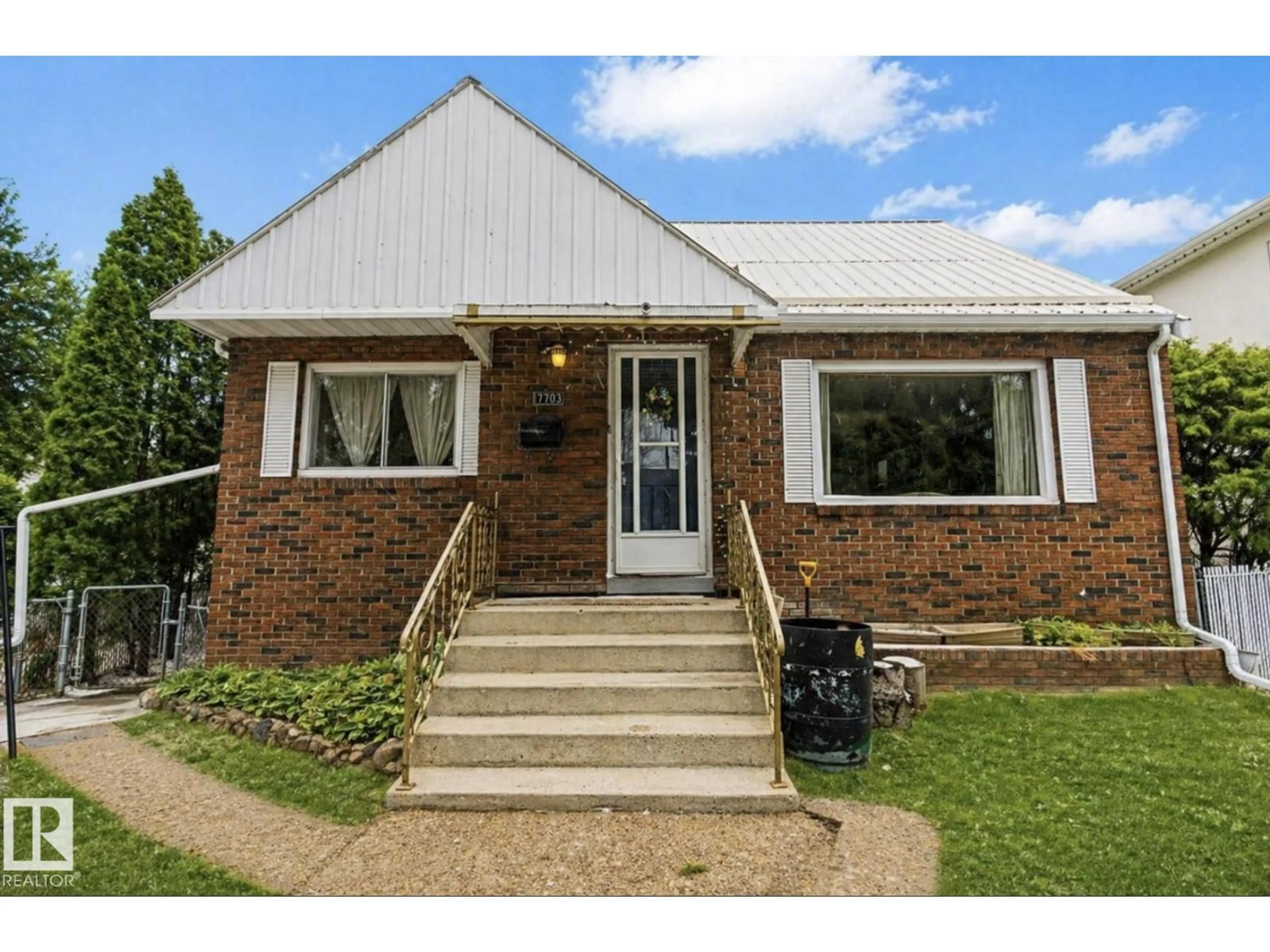 Home with brick exterior material, street for NW - 7703 77 AVENUE, Edmonton Alberta T6C0K6