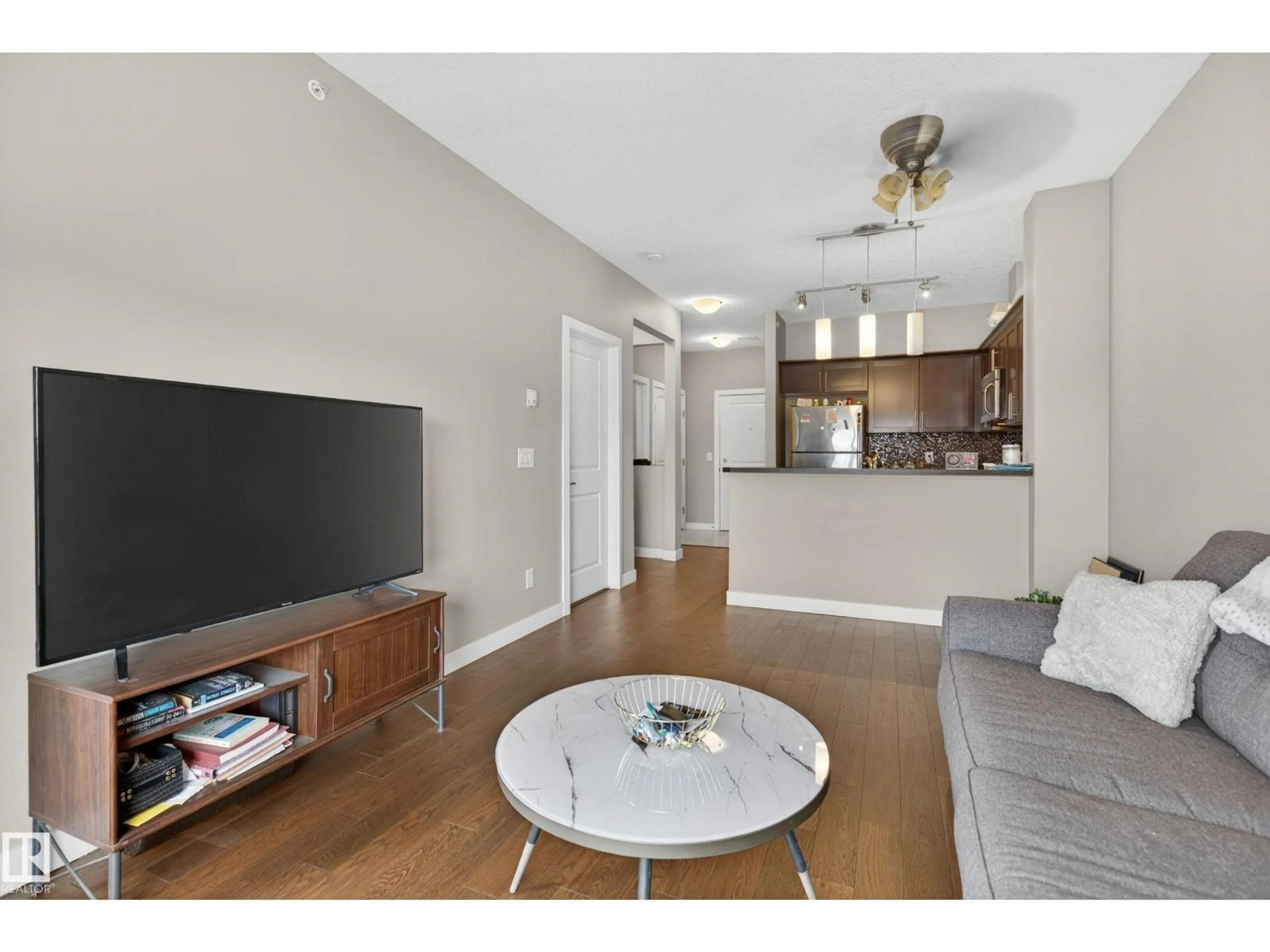 Living room with furniture, unknown for #409 - 2584 ANDERSON WY, Edmonton Alberta T6W0R2