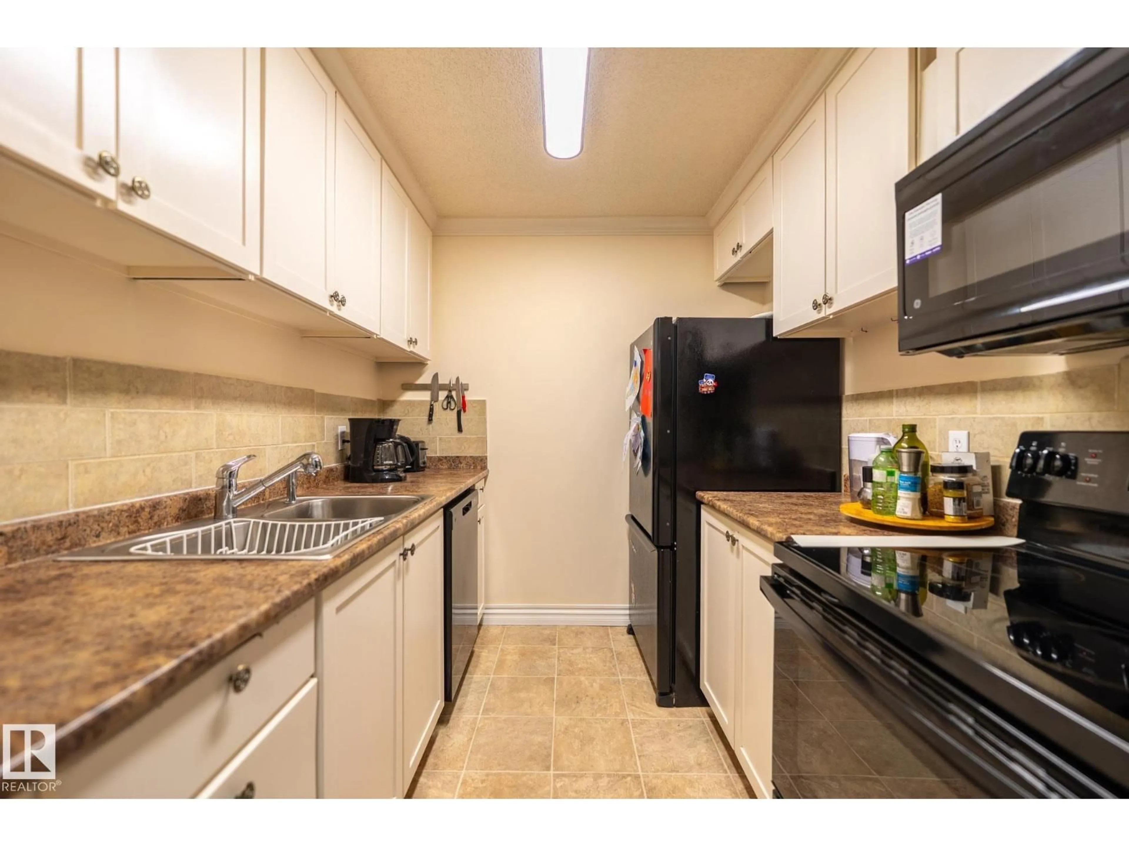 Standard kitchen, unknown for #142 - 10636 120 ST, Edmonton Alberta T5H4L5