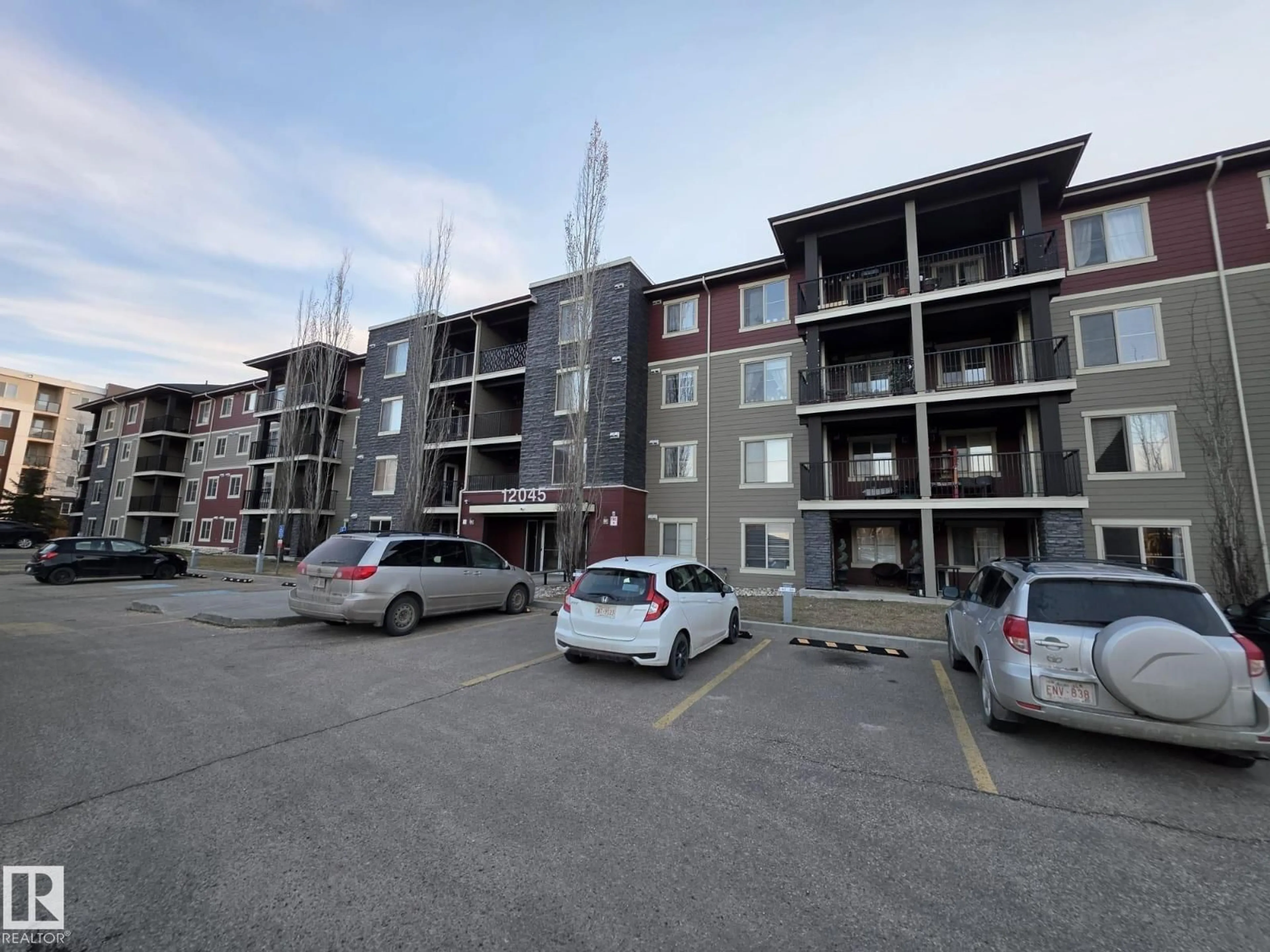 A pic from outside/outdoor area/front of a property/back of a property/a pic from drone, building for #206 - 12045 22 AV SW, Edmonton Alberta T6W2Y2