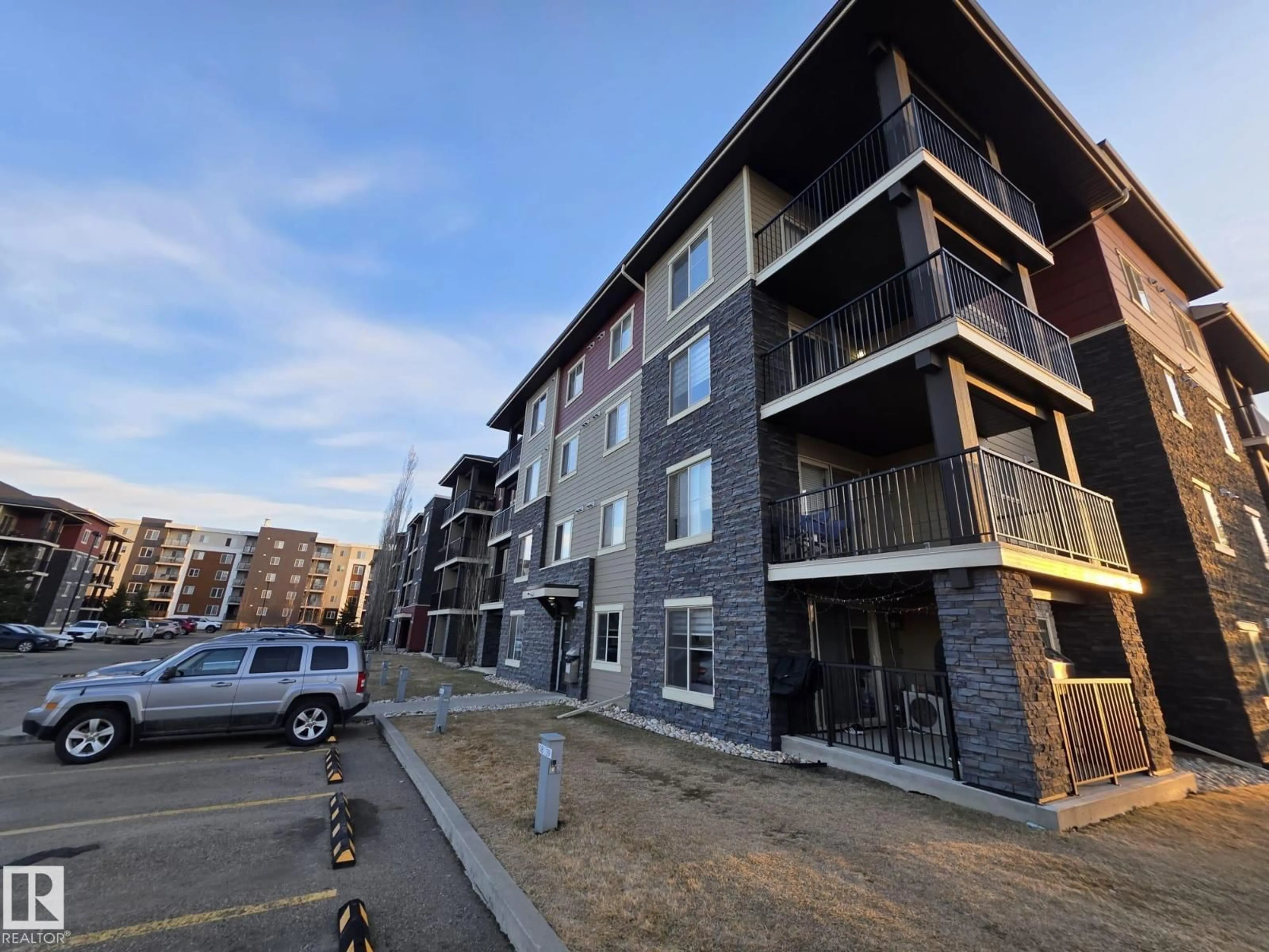 A pic from outside/outdoor area/front of a property/back of a property/a pic from drone, unknown for #206 - 12045 22 AV SW, Edmonton Alberta T6W2Y2