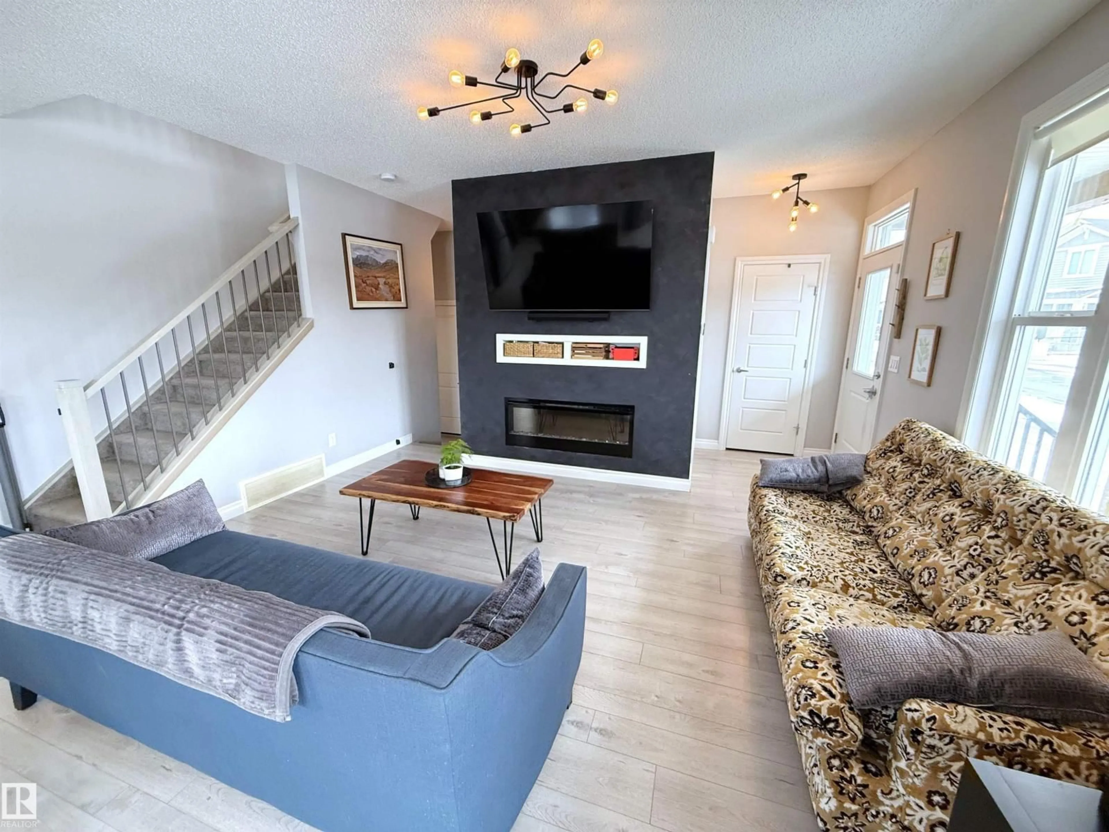 Living room with furniture, unknown for NW - 1807 202 ST, Edmonton Alberta T6M0X9