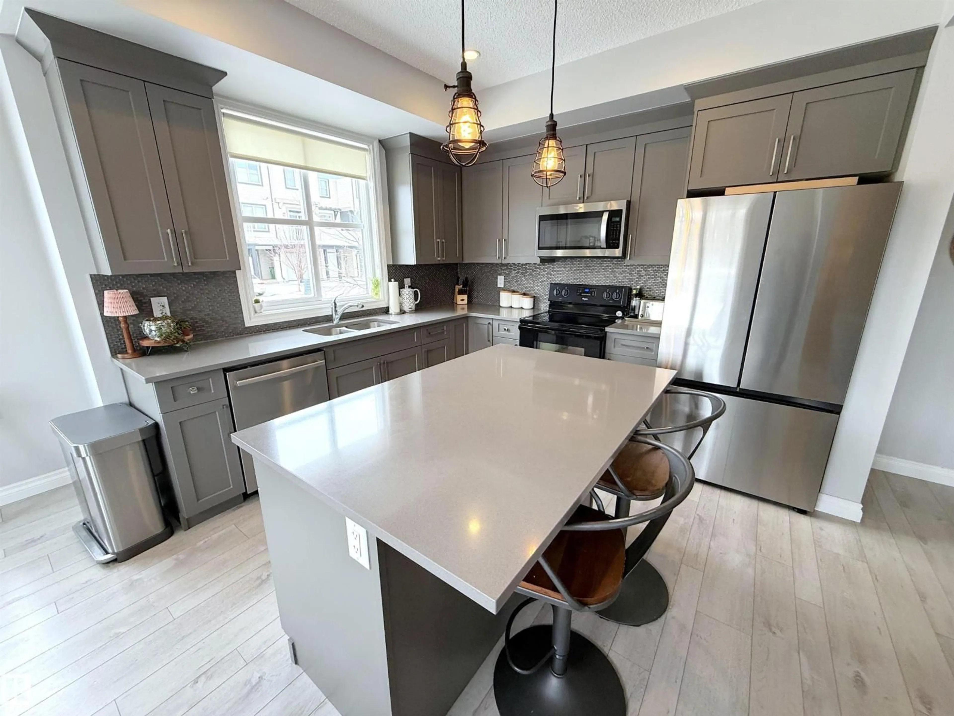 Open concept kitchen, ceramic/tile floor for NW - 1807 202 ST, Edmonton Alberta T6M0X9