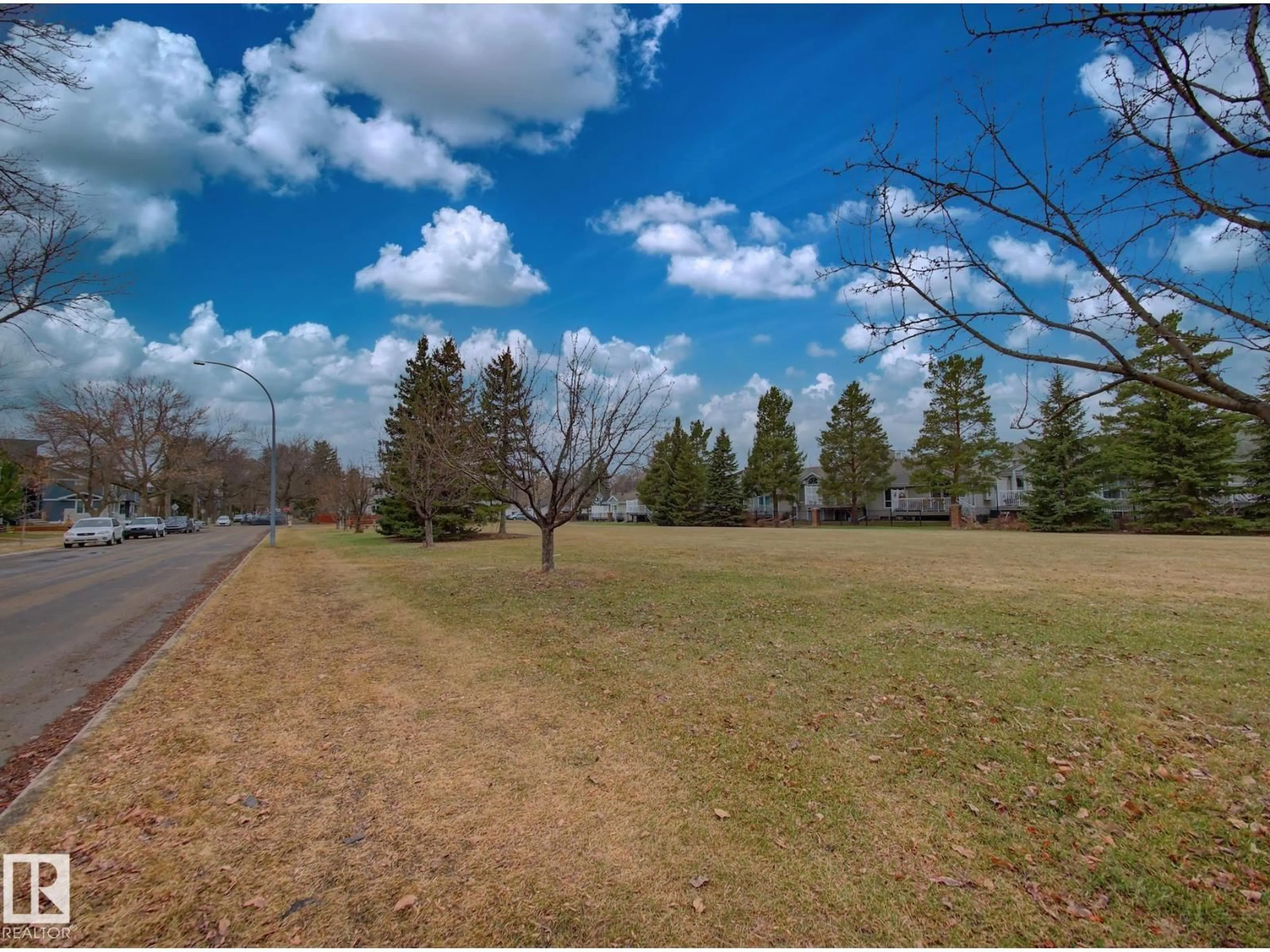 A pic from outside/outdoor area/front of a property/back of a property/a pic from drone, forest/trees view for 9533 77 AV, Edmonton Alberta T6C0M3