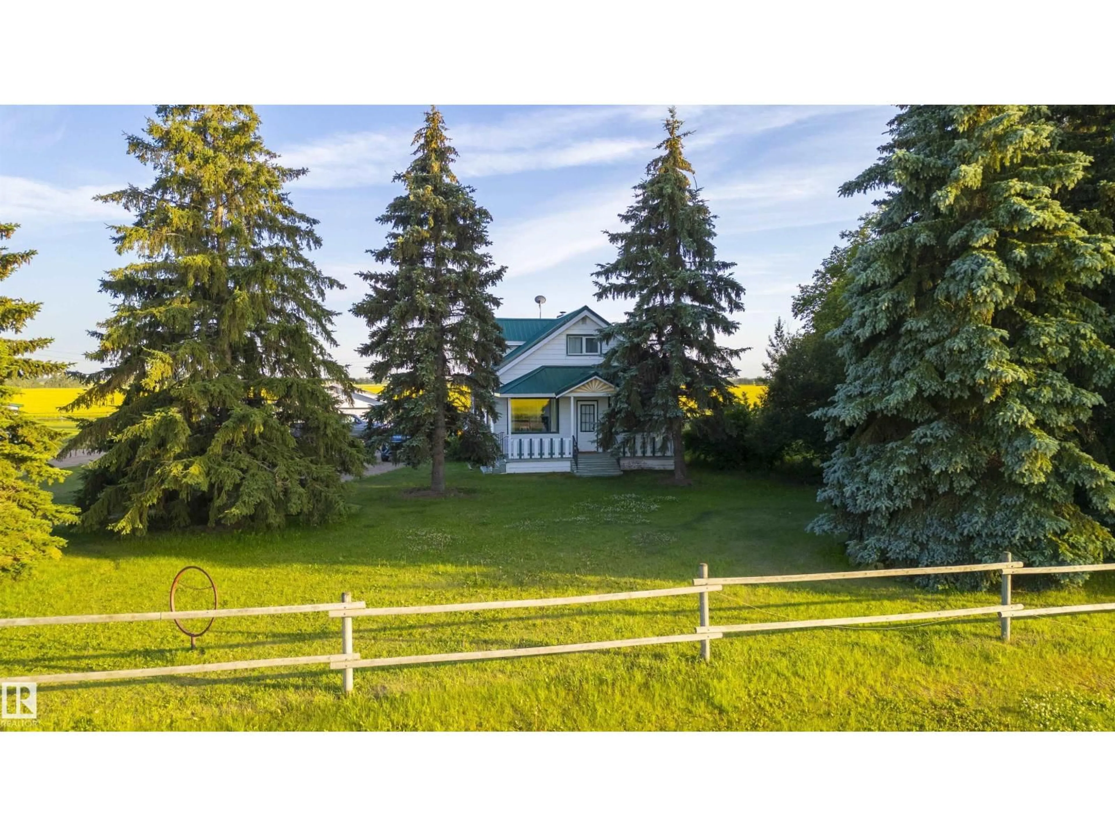 A pic from outside/outdoor area/front of a property/back of a property/a pic from drone, mountain view for 24523 TWP ROAD 582, Rural Sturgeon County Alberta T0G1L2