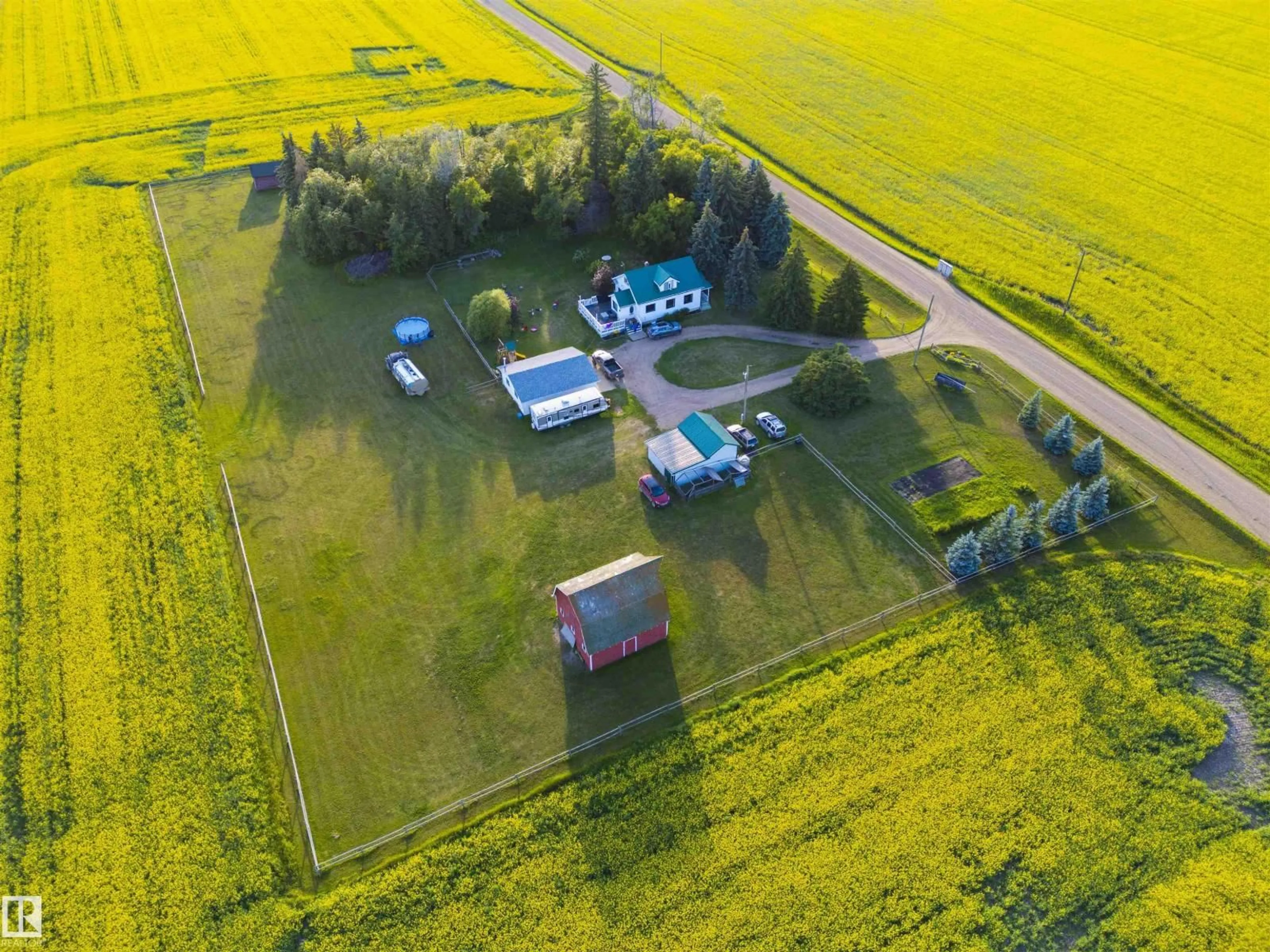 A pic from outside/outdoor area/front of a property/back of a property/a pic from drone, building for 24523 TWP ROAD 582, Rural Sturgeon County Alberta T0G1L2