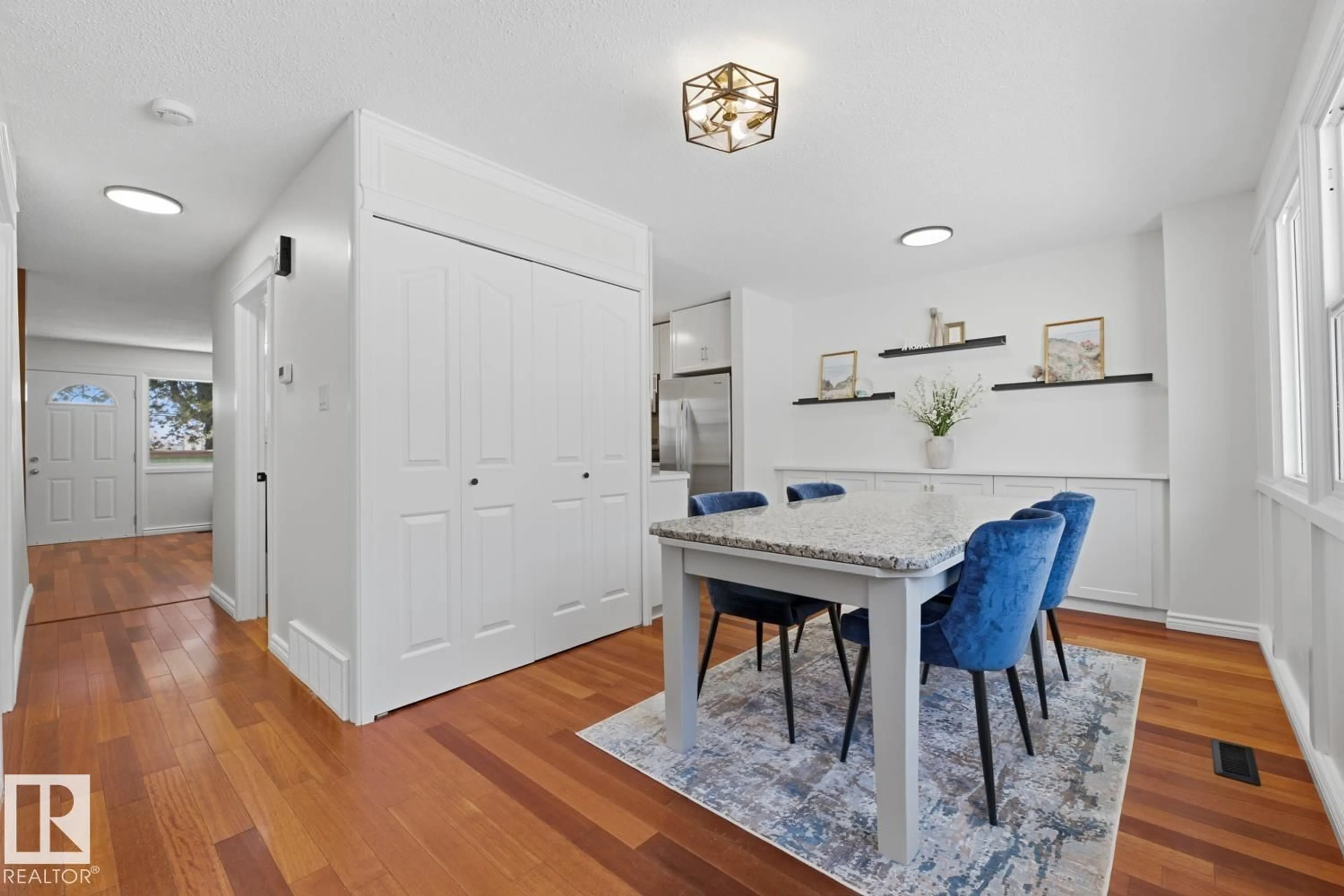 Dining room, wood/laminate floor for 413 VILLAGE ON THE GREEN GR, Edmonton Alberta T5A1G9