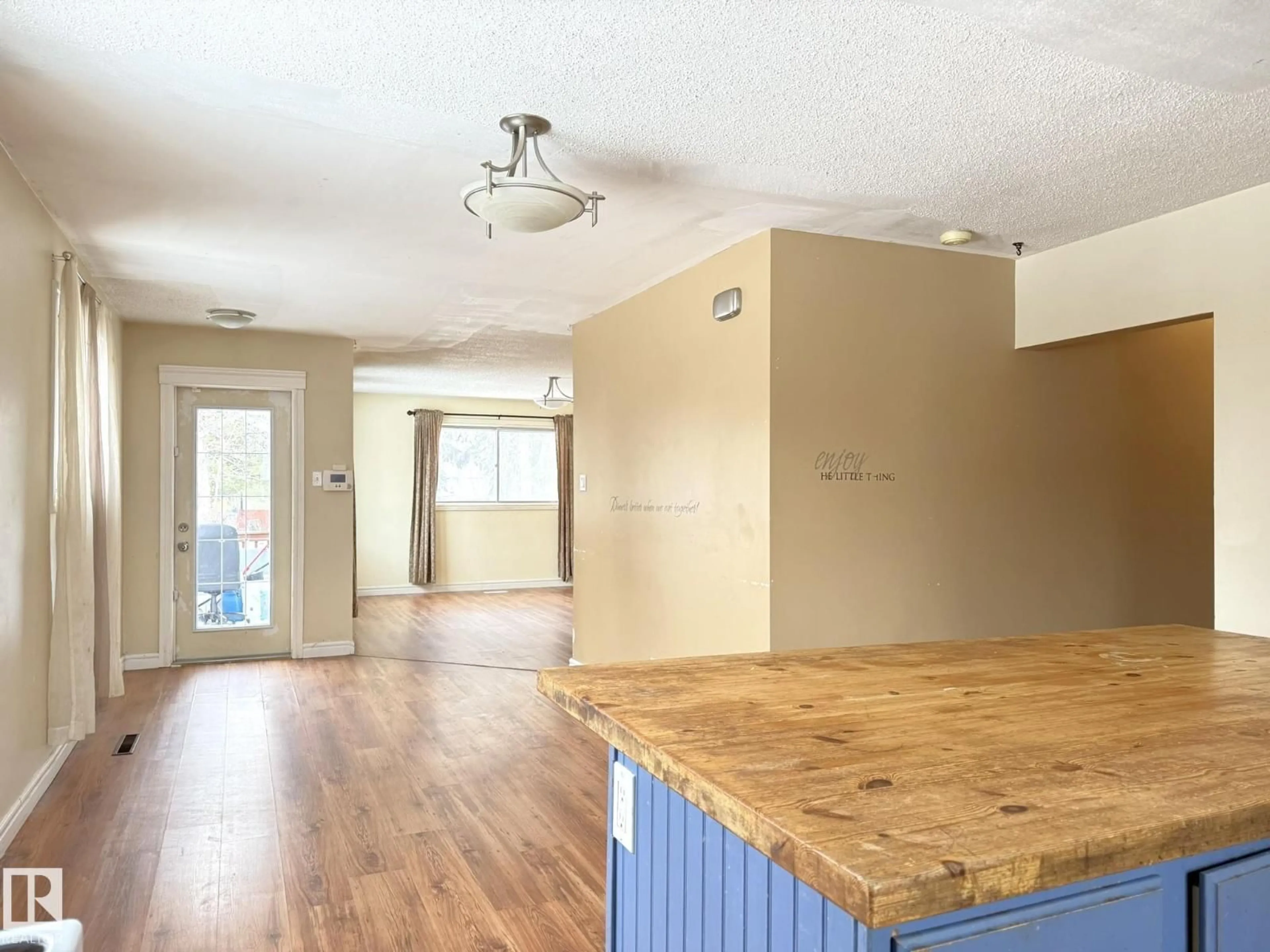 Open concept kitchen, wood/laminate floor for 5116 48 ST, Warburg Alberta T0C2T0