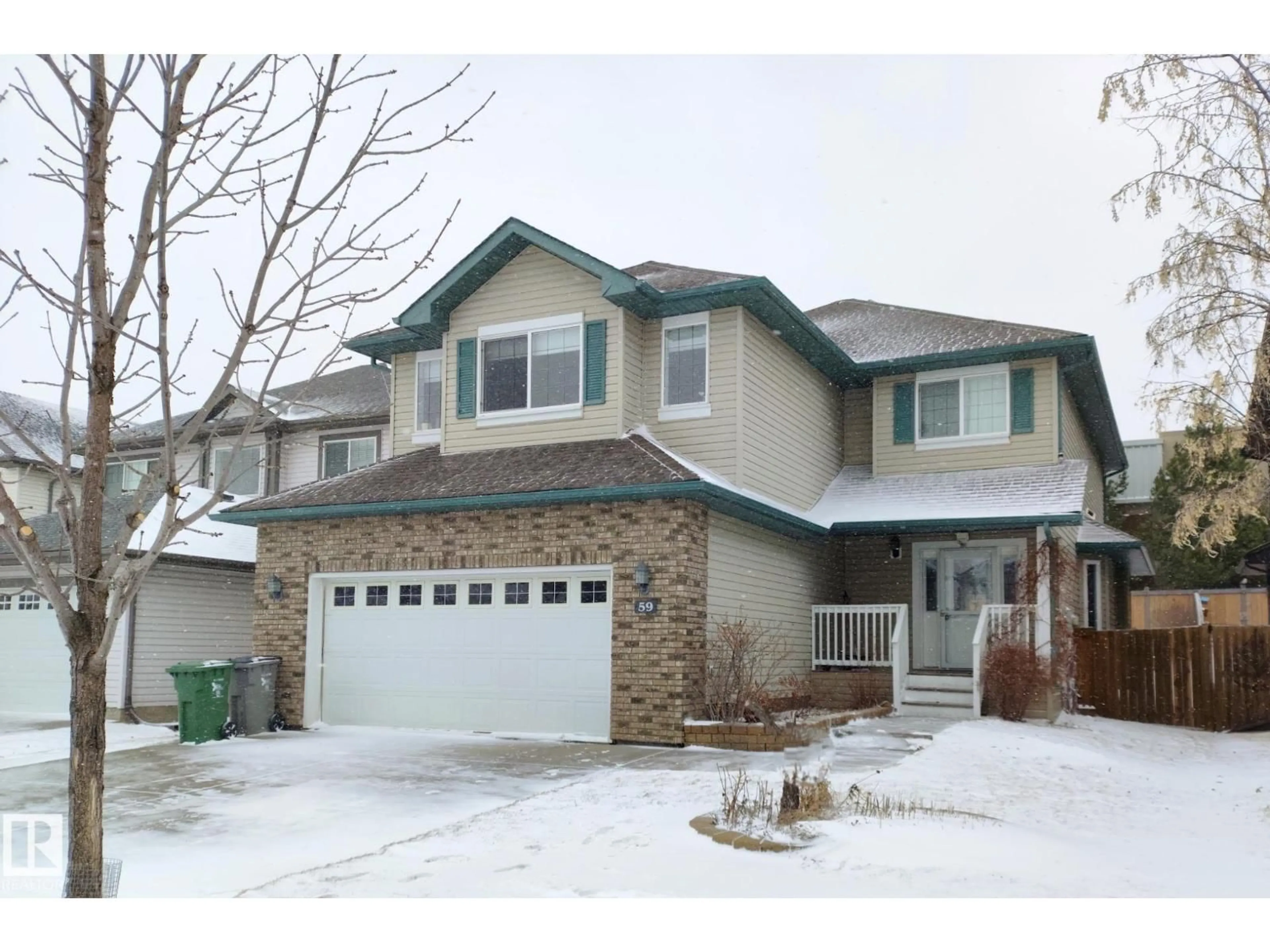 Home with vinyl exterior material, street for 59 RUE MONETTE, Beaumont Alberta T4X1T2