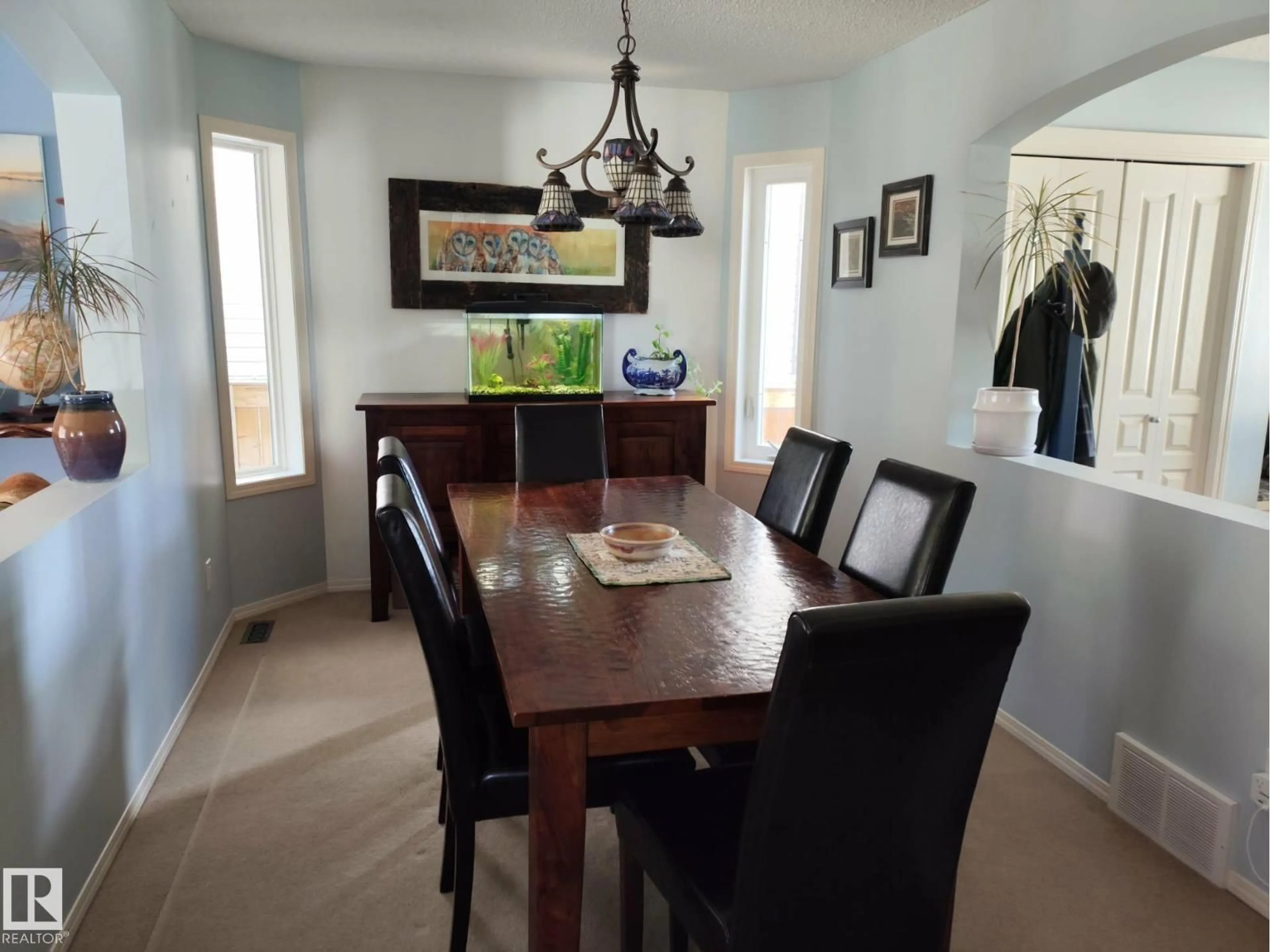 Dining room, wood/laminate floor for 59 RUE MONETTE, Beaumont Alberta T4X1T2