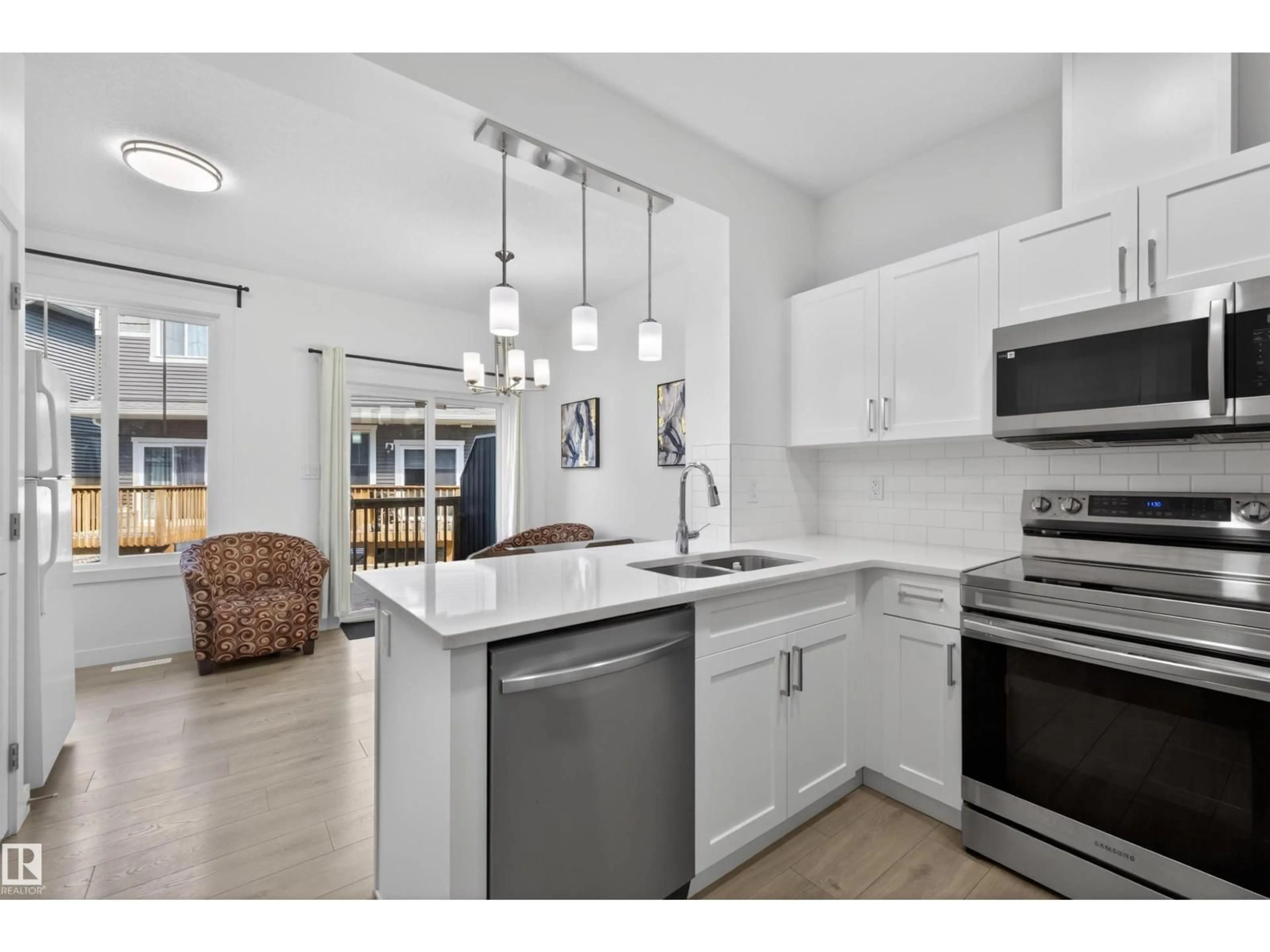 Open concept kitchen, ceramic/tile floor for 603 - 51 ORCHARDS BV, Edmonton Alberta T6X2W8