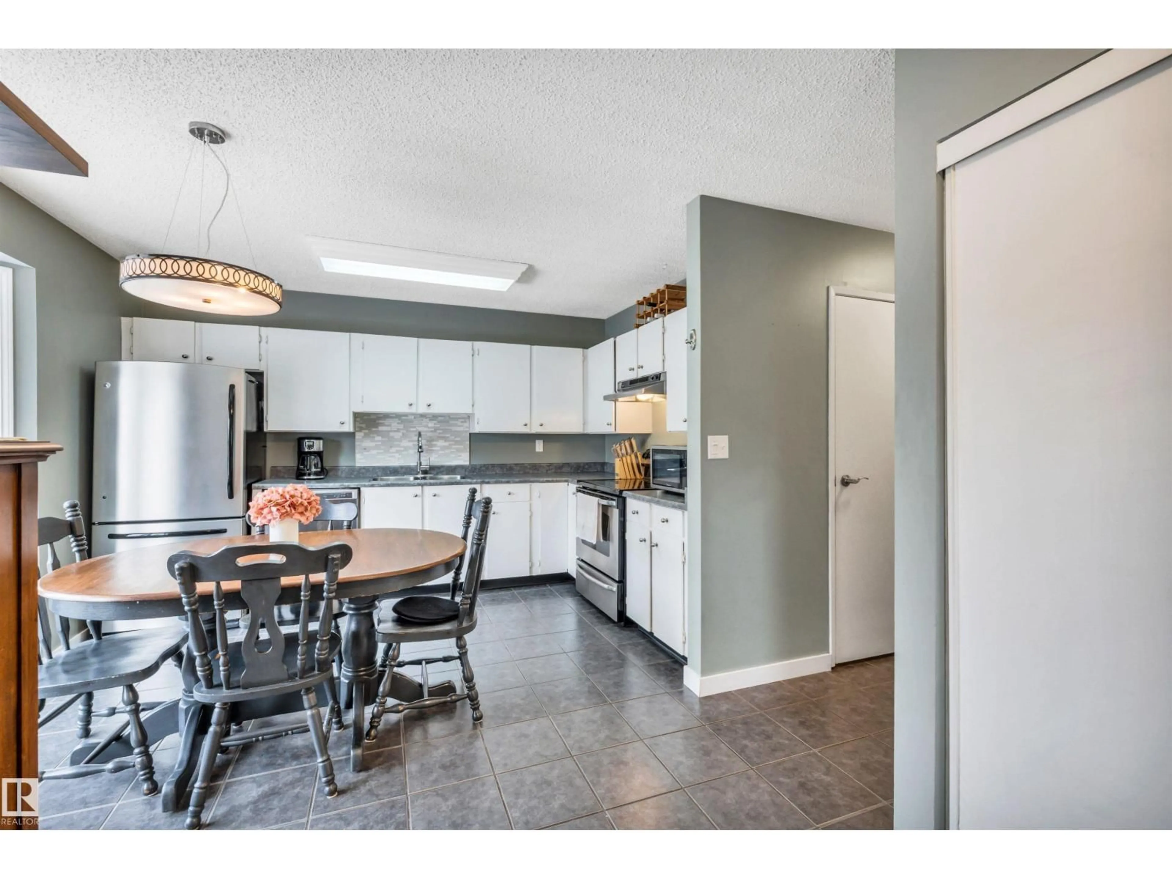 Open concept kitchen, unknown for #40 - 10205 158 AV, Edmonton Alberta T5X5E5