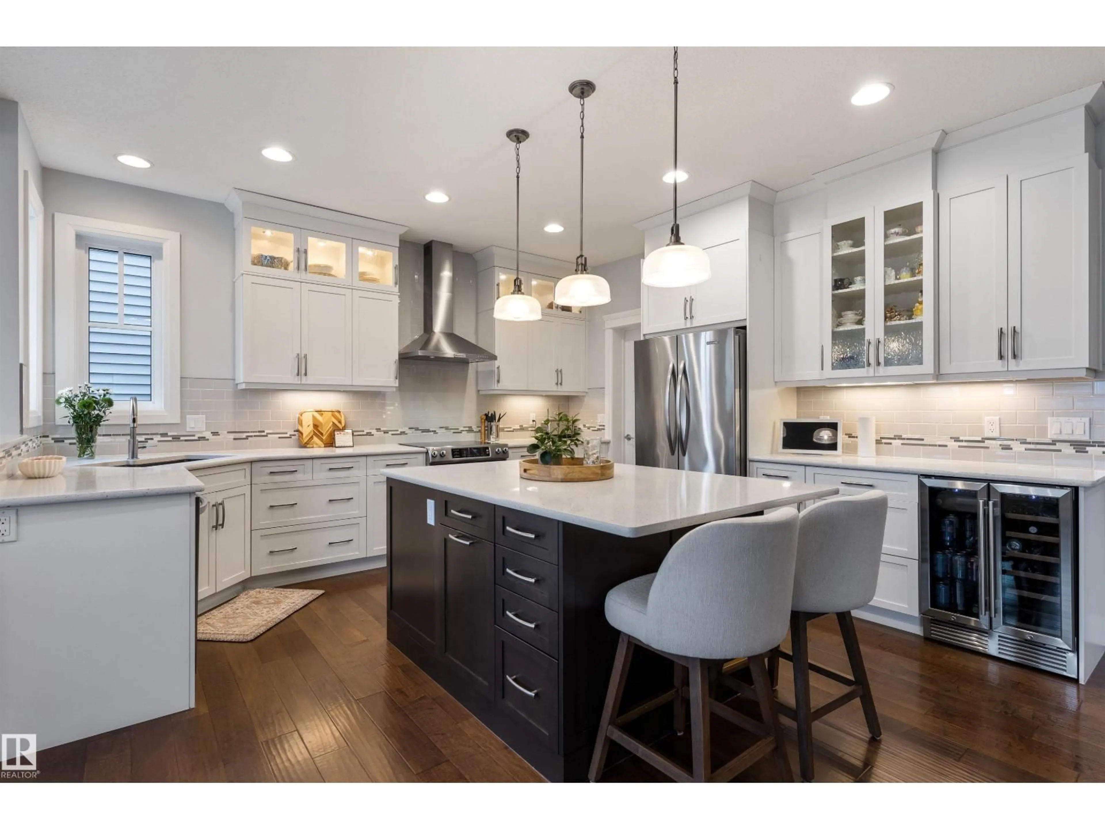 Open concept kitchen, wood/laminate floor for LI SW - 1981 AINSLIE LINK, Edmonton Alberta T6W2M1