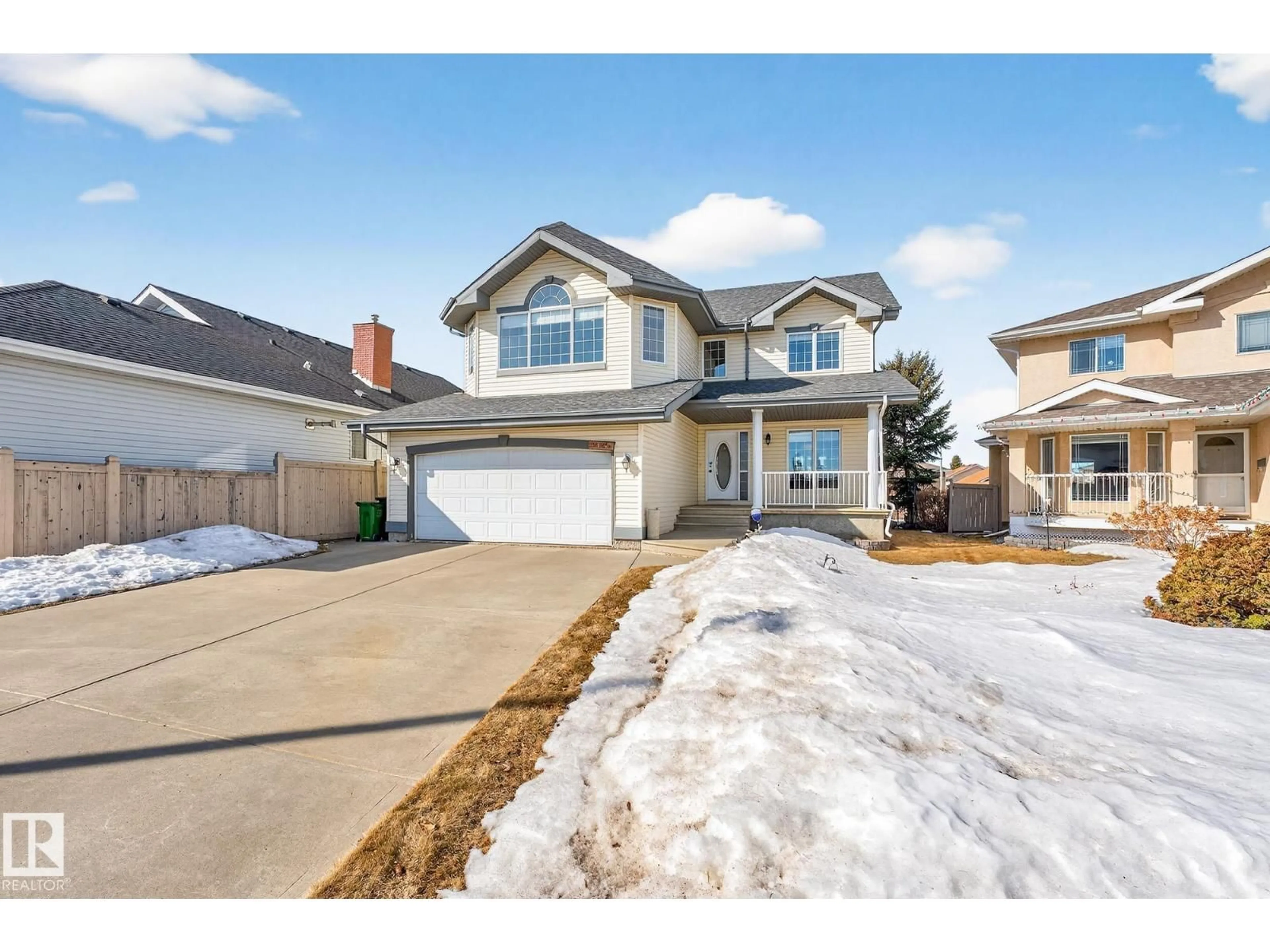 Home with vinyl exterior material, street for NW - 1354 118A ST, Edmonton Alberta T6J7G2