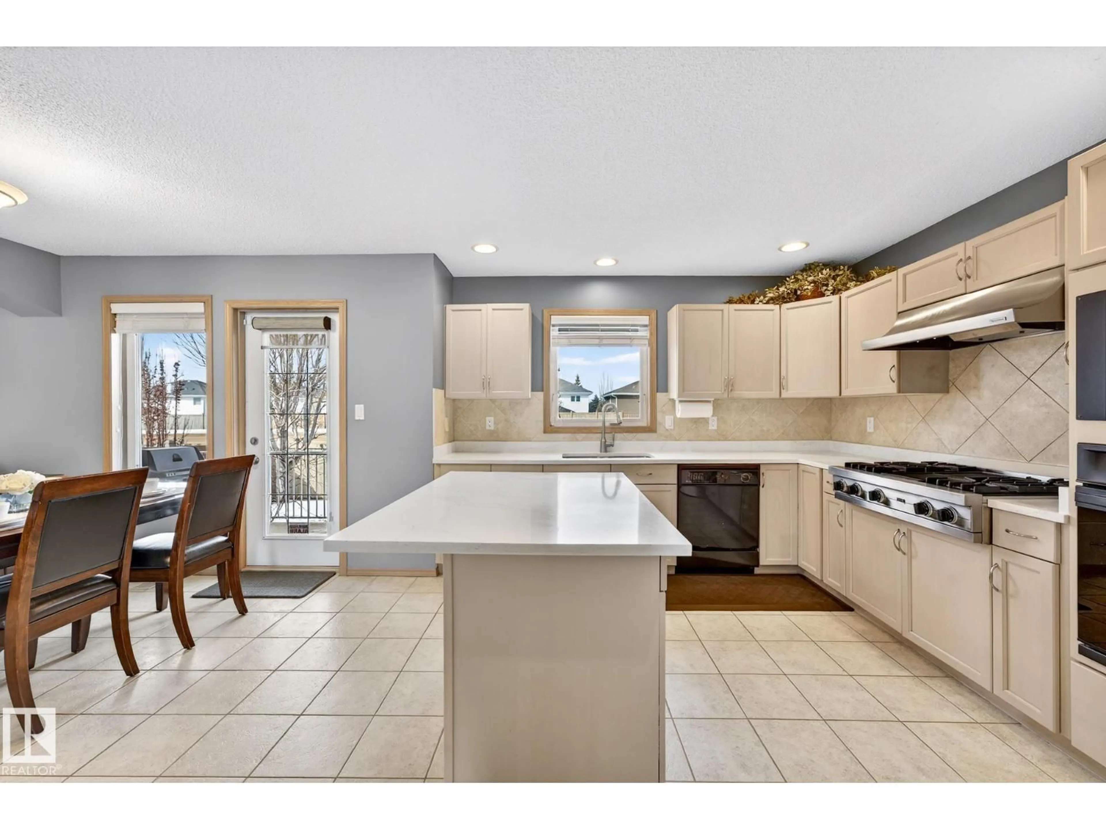 Open concept kitchen, ceramic/tile floor for NW - 1354 118A ST, Edmonton Alberta T6J7G2