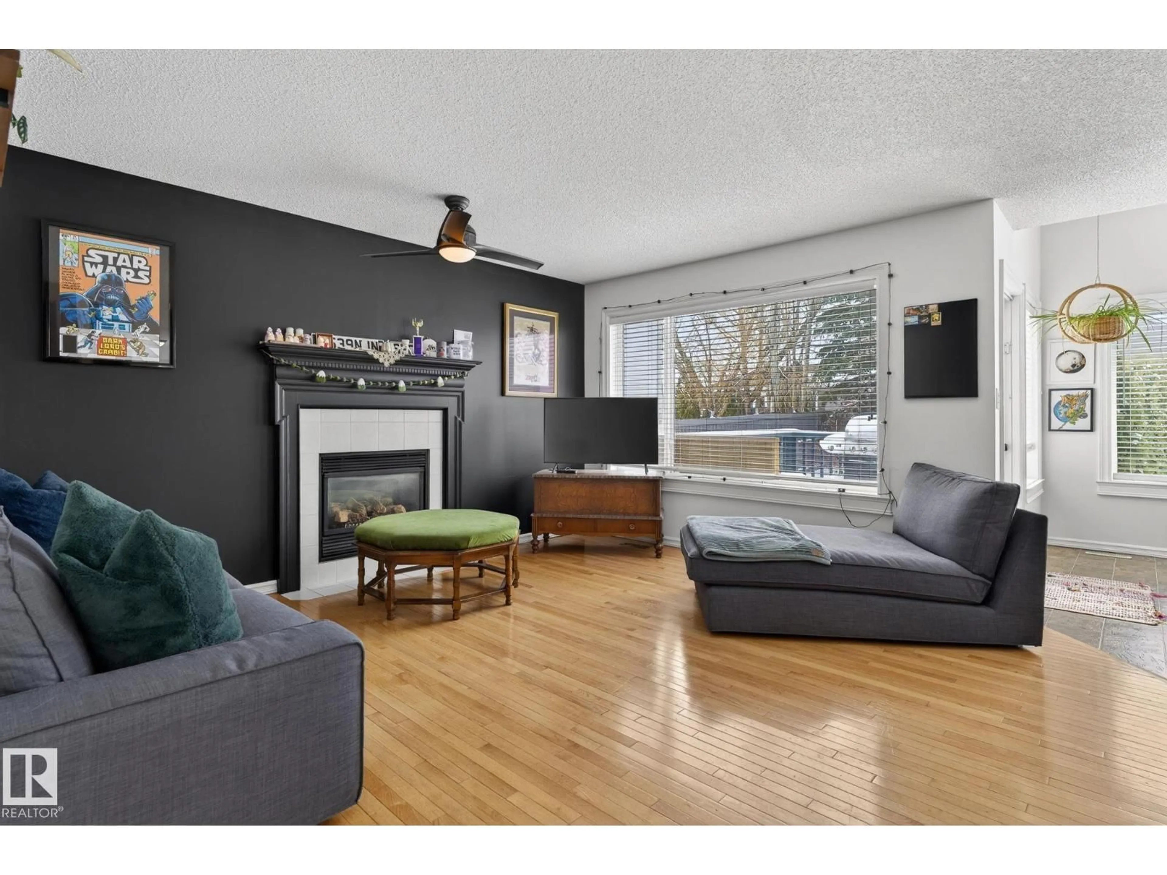 Living room with furniture, wood/laminate floor for 24 FORREST PL, Sherwood Park Alberta T8A5Z9