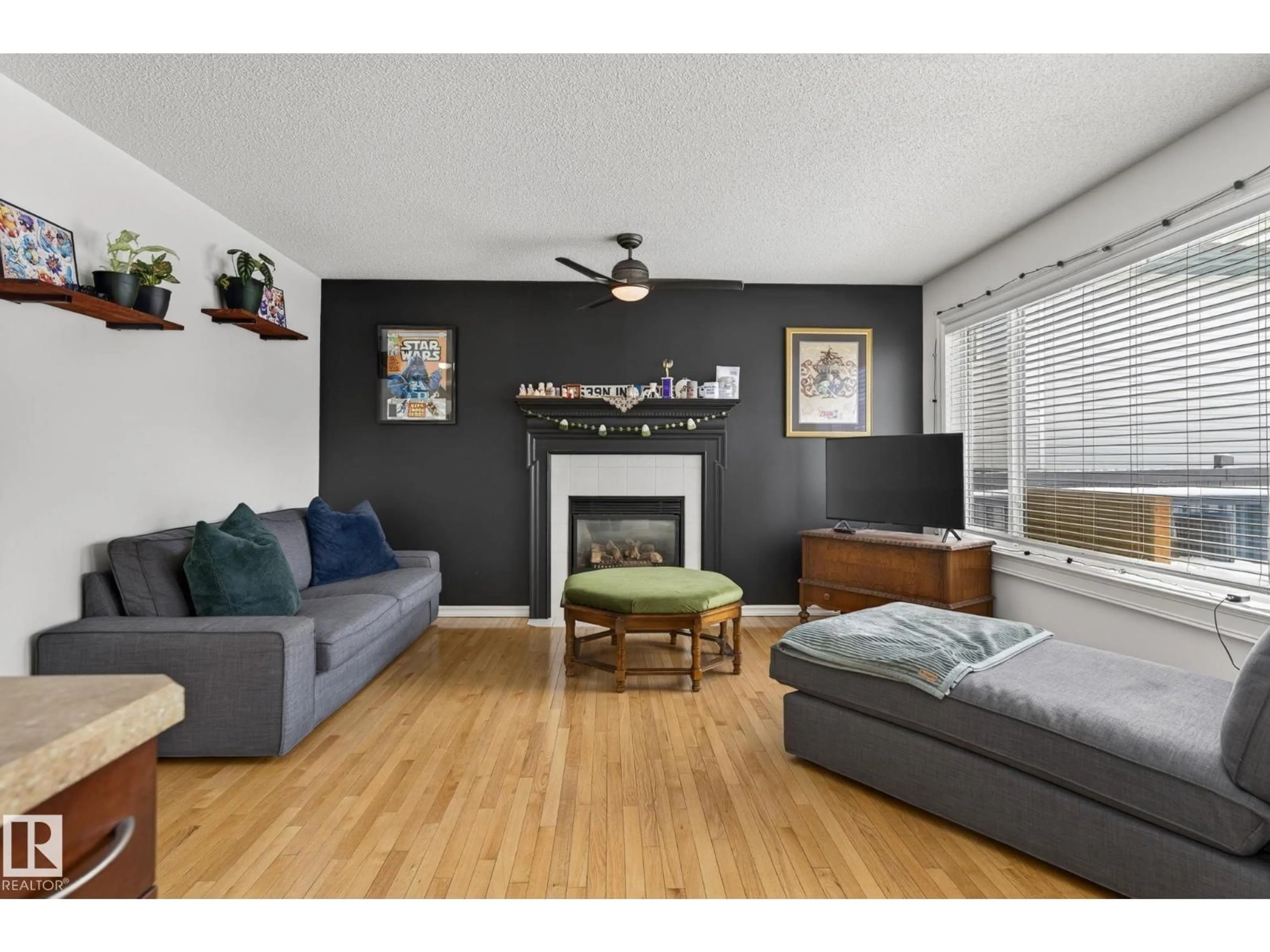 Living room with furniture, wood/laminate floor for 24 FORREST PL, Sherwood Park Alberta T8A5Z9