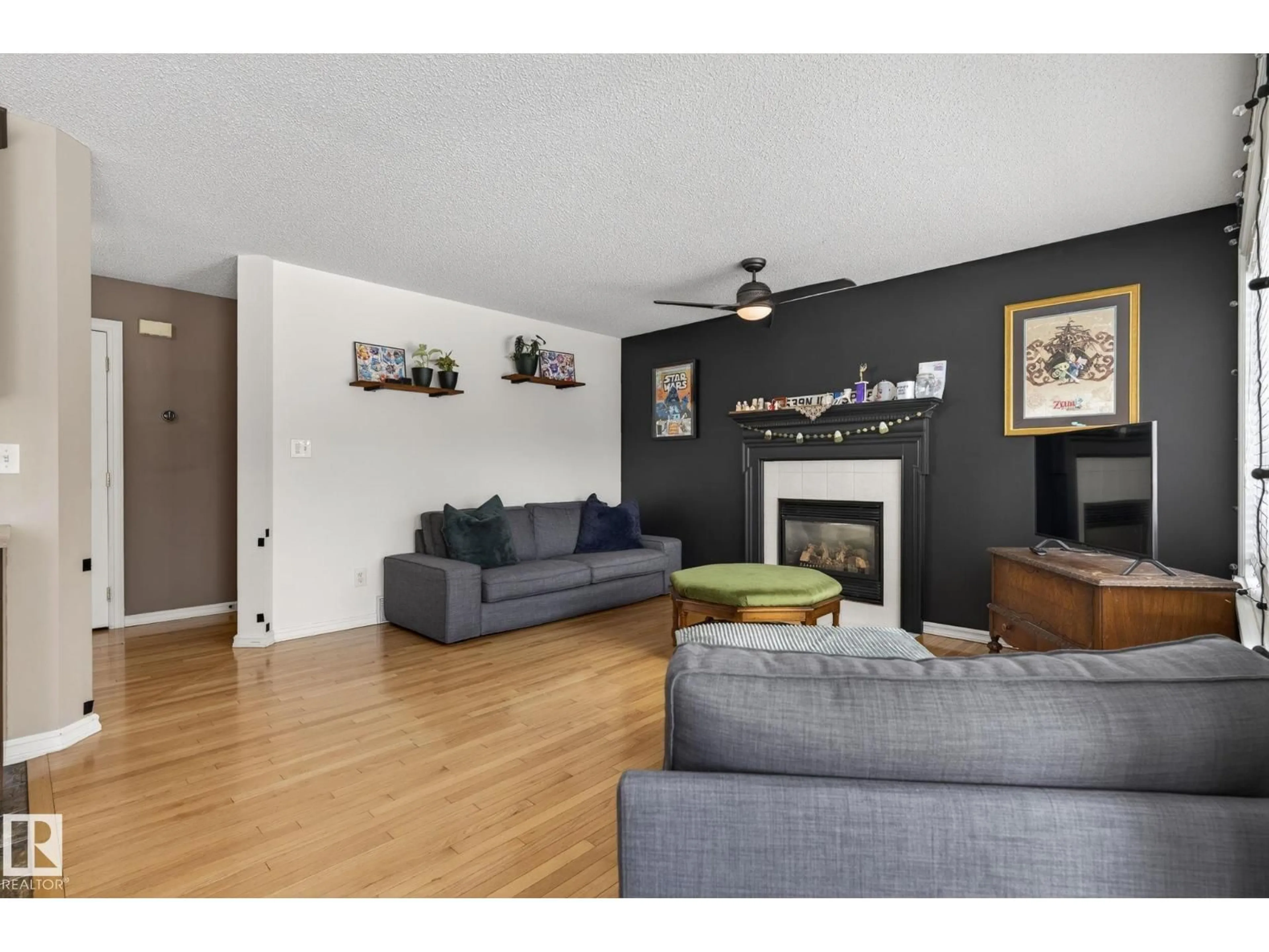 Living room with furniture, wood/laminate floor for 24 FORREST PL, Sherwood Park Alberta T8A5Z9