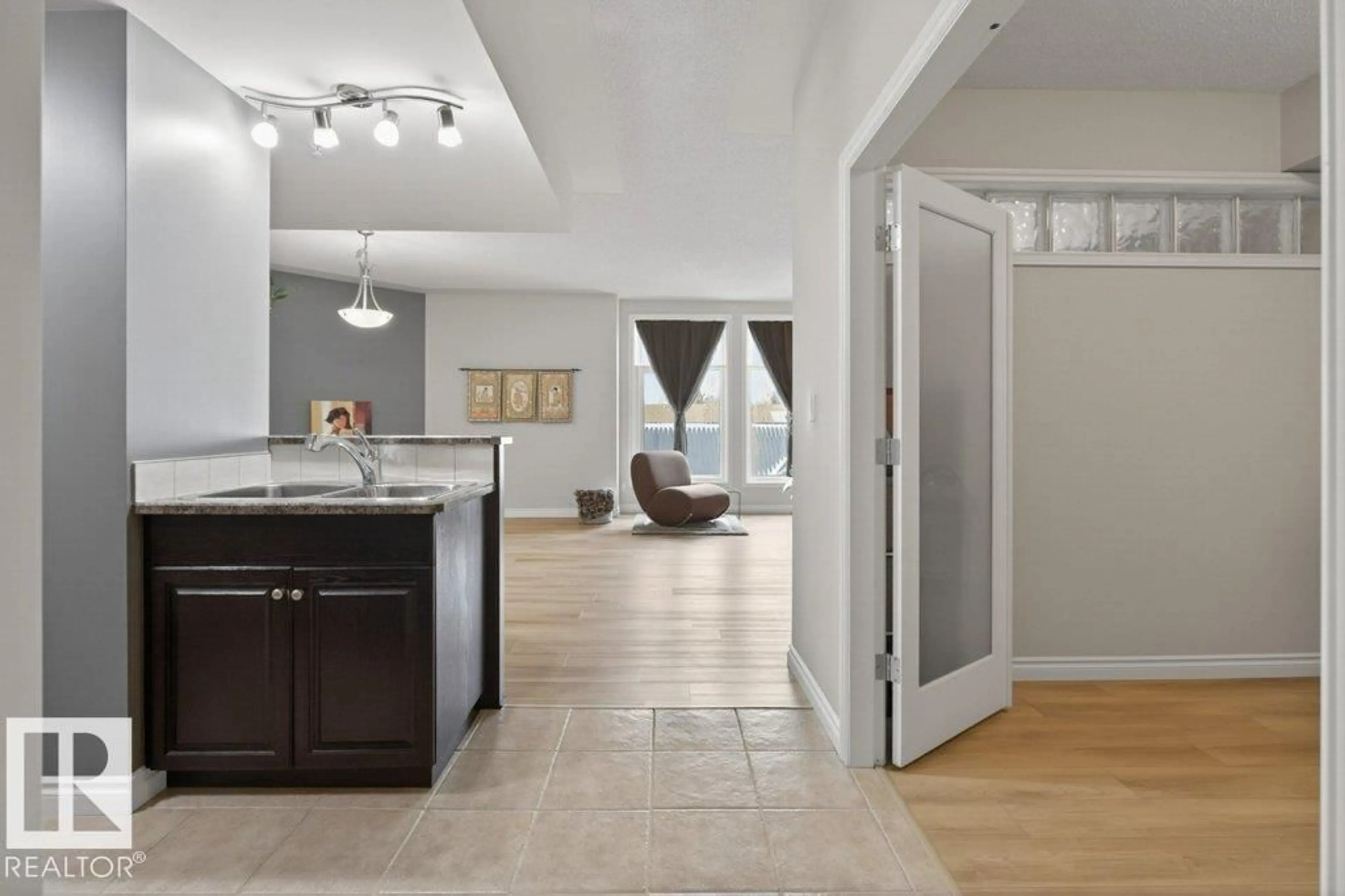 Open concept kitchen, ceramic/tile floor for #408 - 9020 JASPER AV NW, Edmonton Alberta T5H3S8