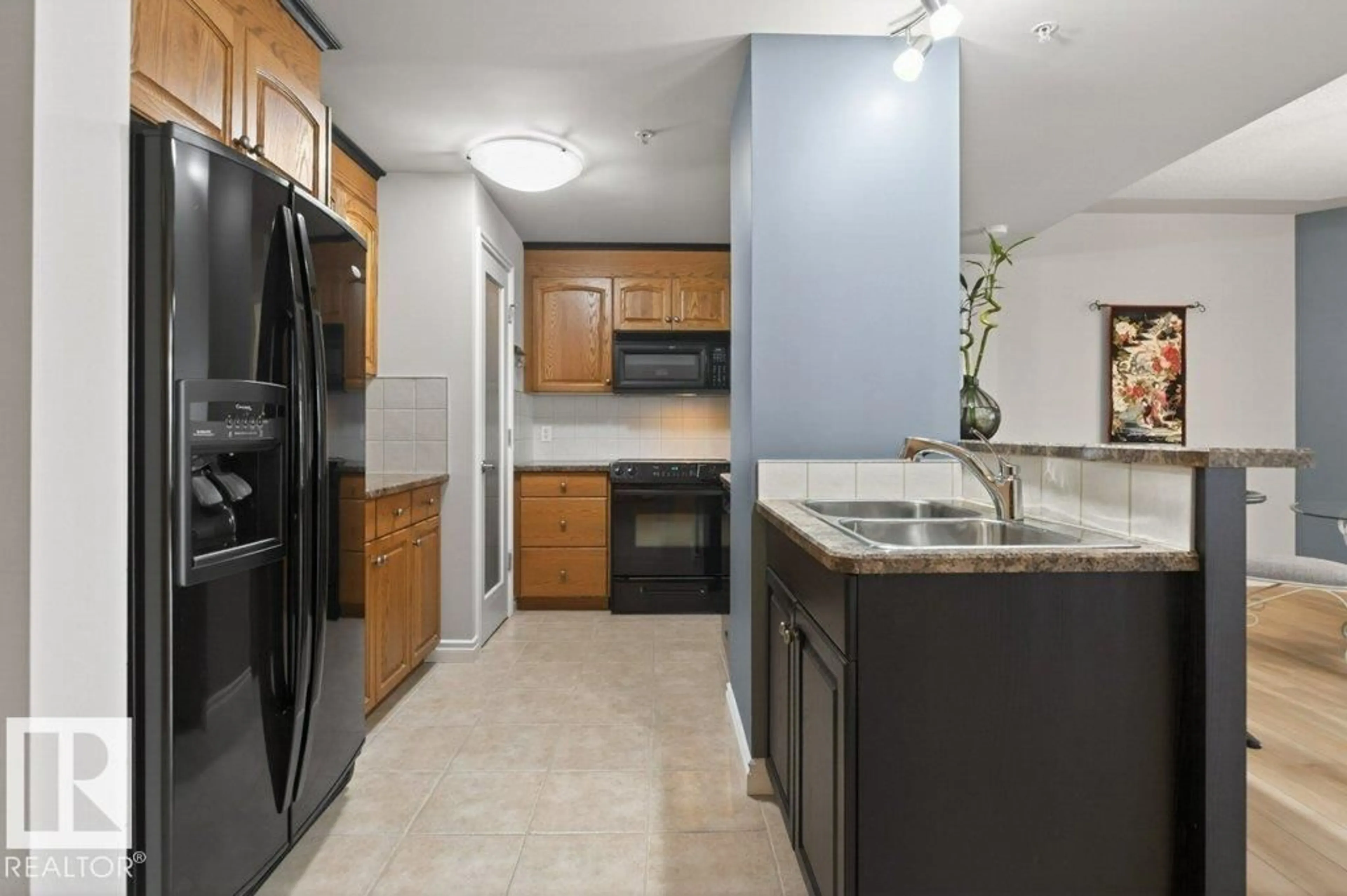 Standard kitchen, ceramic/tile floor for #408 - 9020 JASPER AV NW, Edmonton Alberta T5H3S8