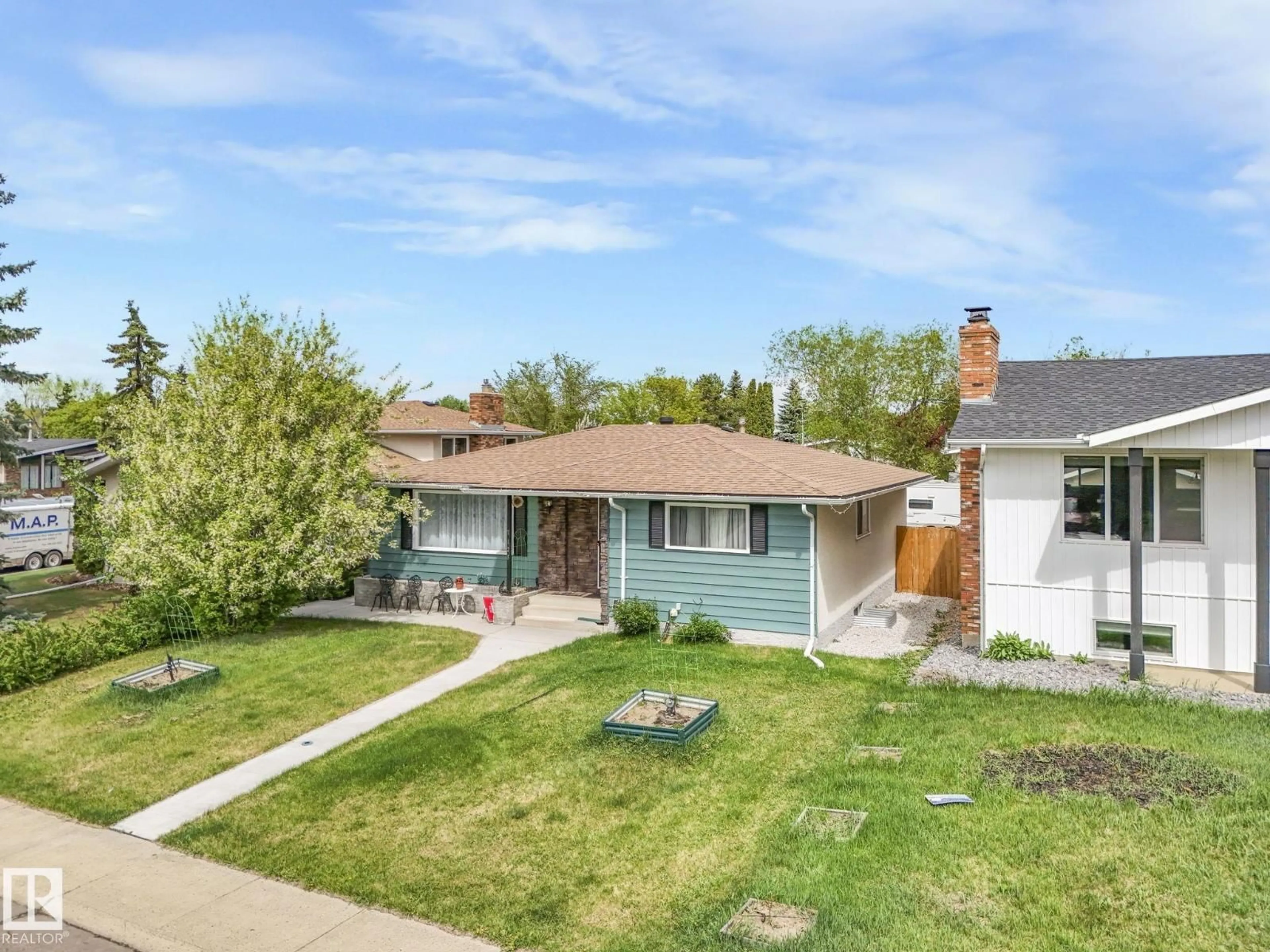 A pic from outside/outdoor area/front of a property/back of a property/a pic from drone, street for 7120 39 AV, Edmonton Alberta T6K0R6
