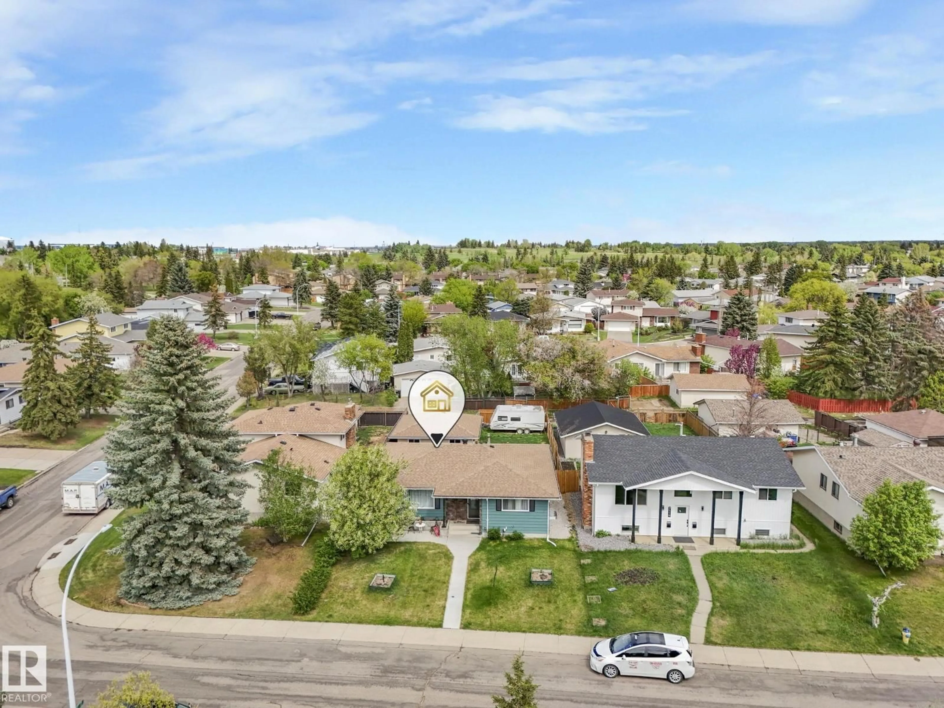A pic from outside/outdoor area/front of a property/back of a property/a pic from drone, street for 7120 39 AV, Edmonton Alberta T6K0R6