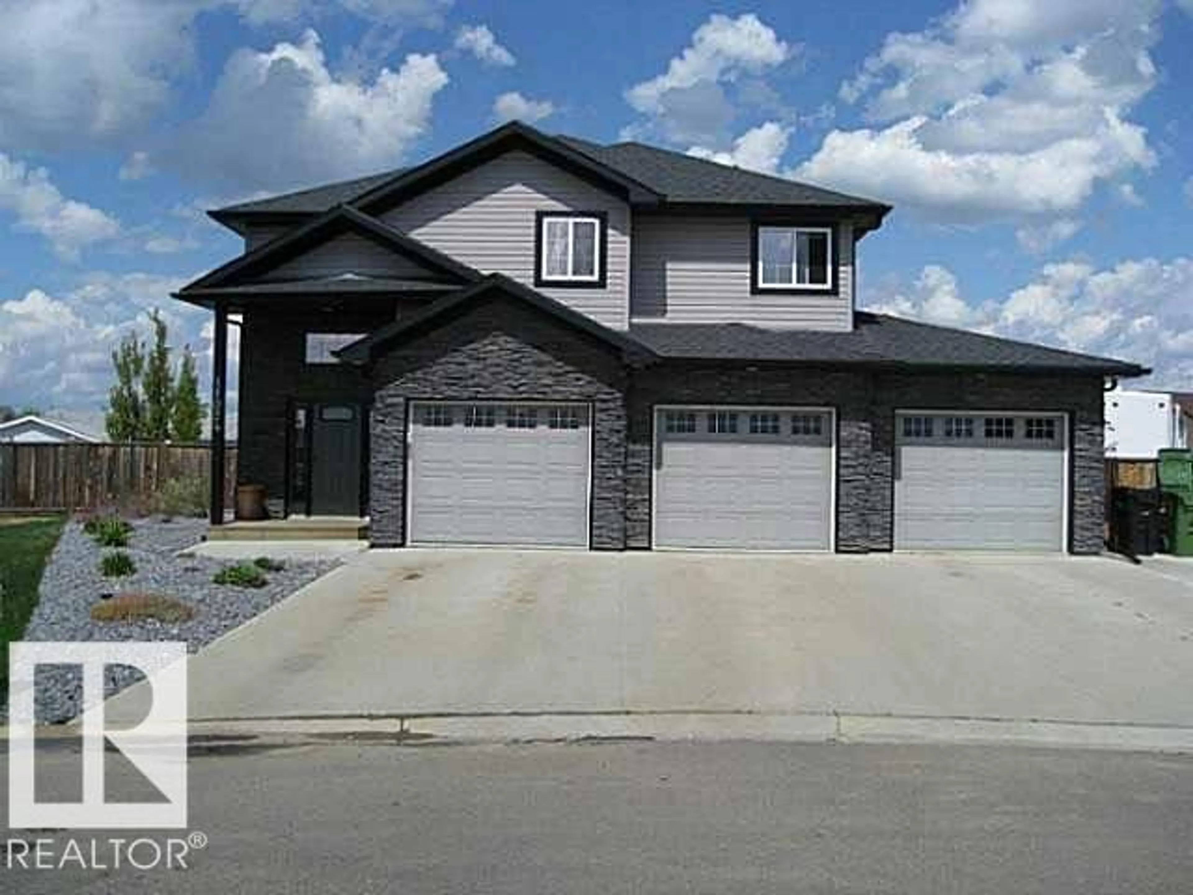 Home with vinyl exterior material, street for 11024 103 ST, Westlock Alberta T7P1G6