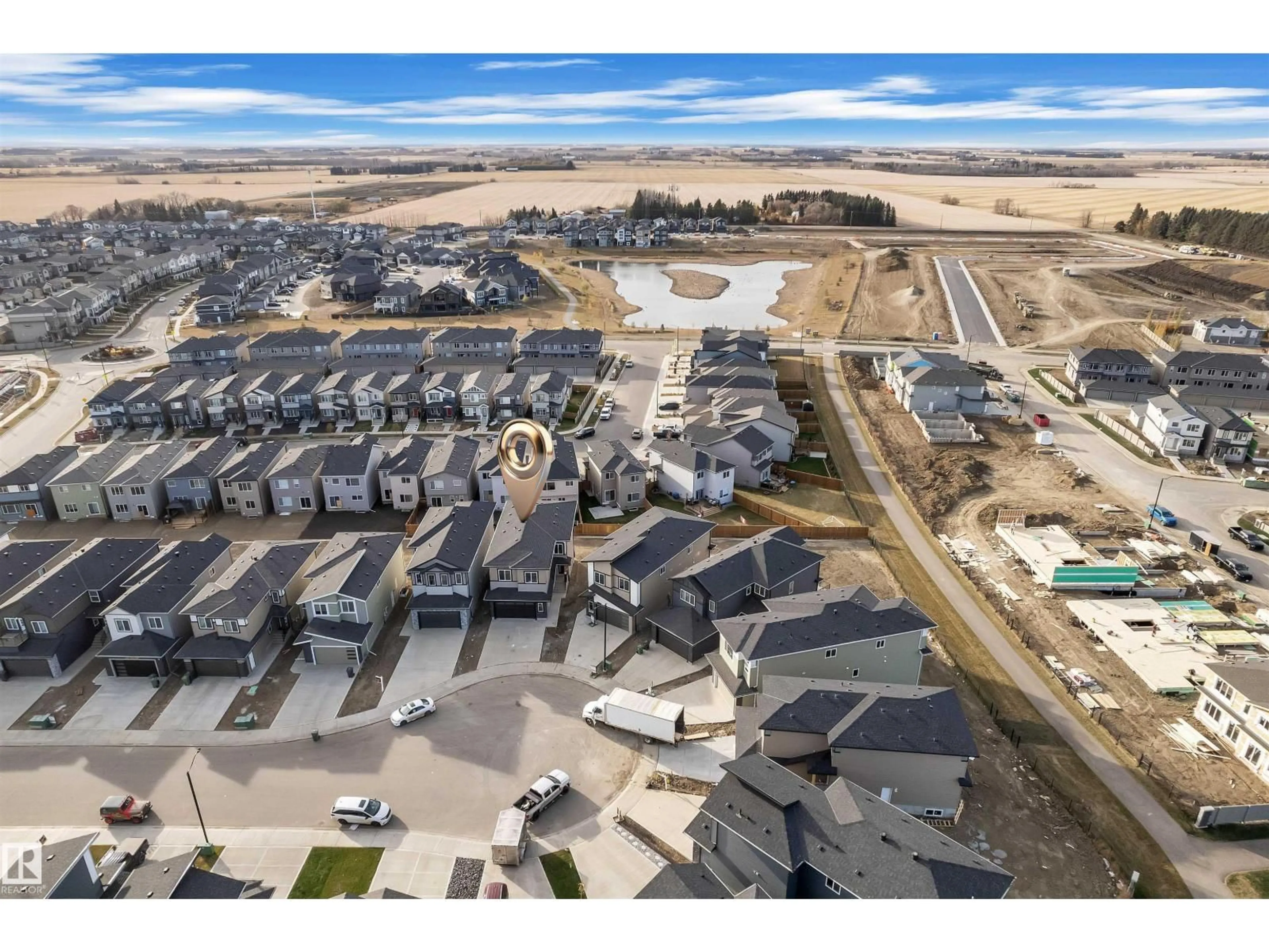 A pic from outside/outdoor area/front of a property/back of a property/a pic from drone, street for 415 PINE PT, Leduc Alberta T9E1S7