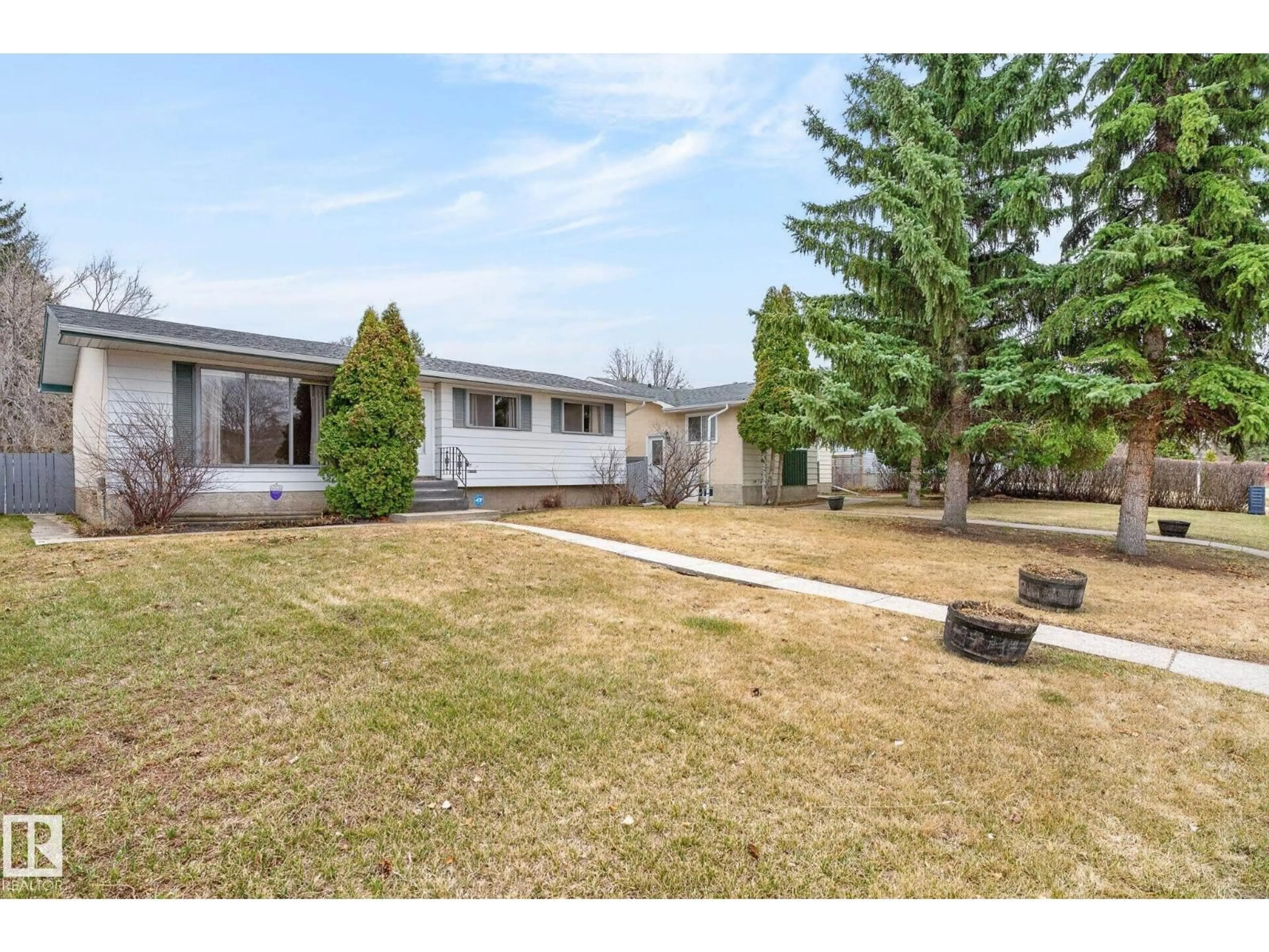 A pic from outside/outdoor area/front of a property/back of a property/a pic from drone, street for 17 BROOKSIDE CR, Spruce Grove Alberta T7X1B8