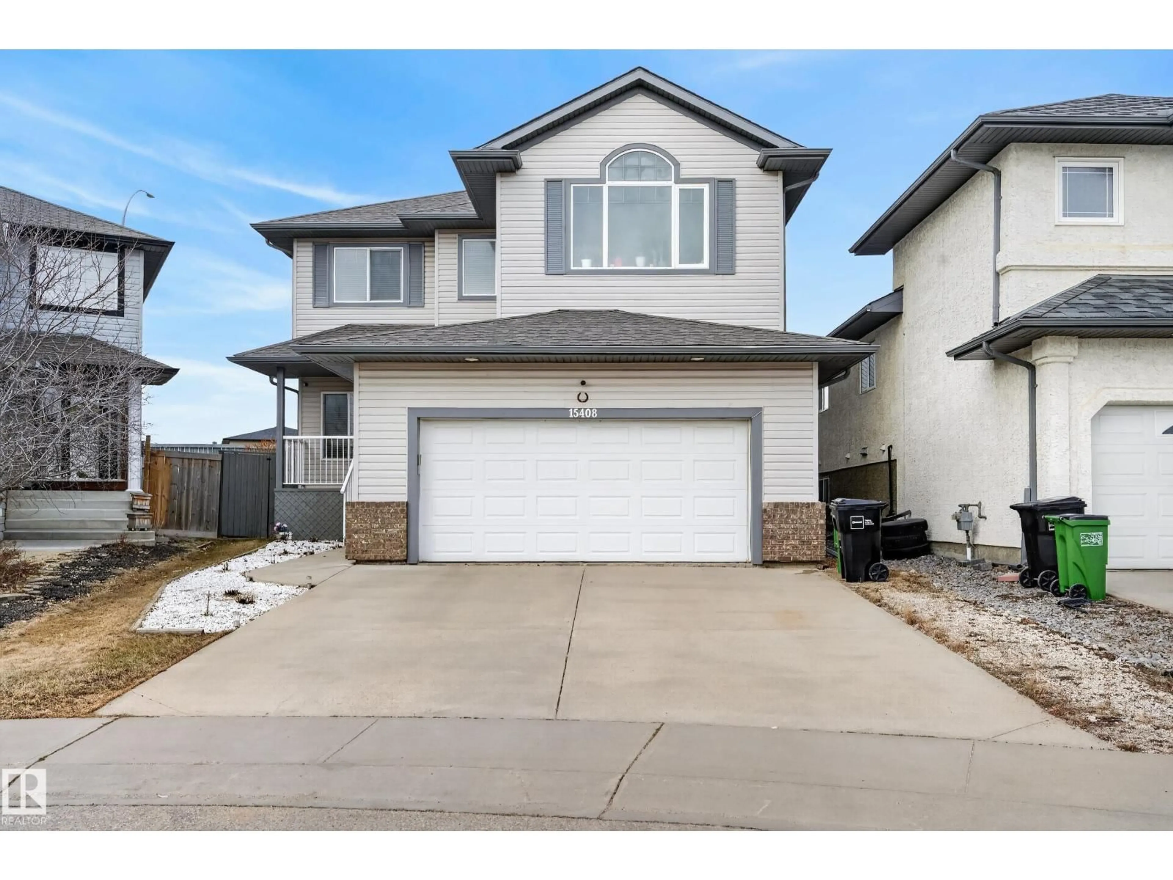 Home with vinyl exterior material, street for 15408 49 ST, Edmonton Alberta T5Y0C1