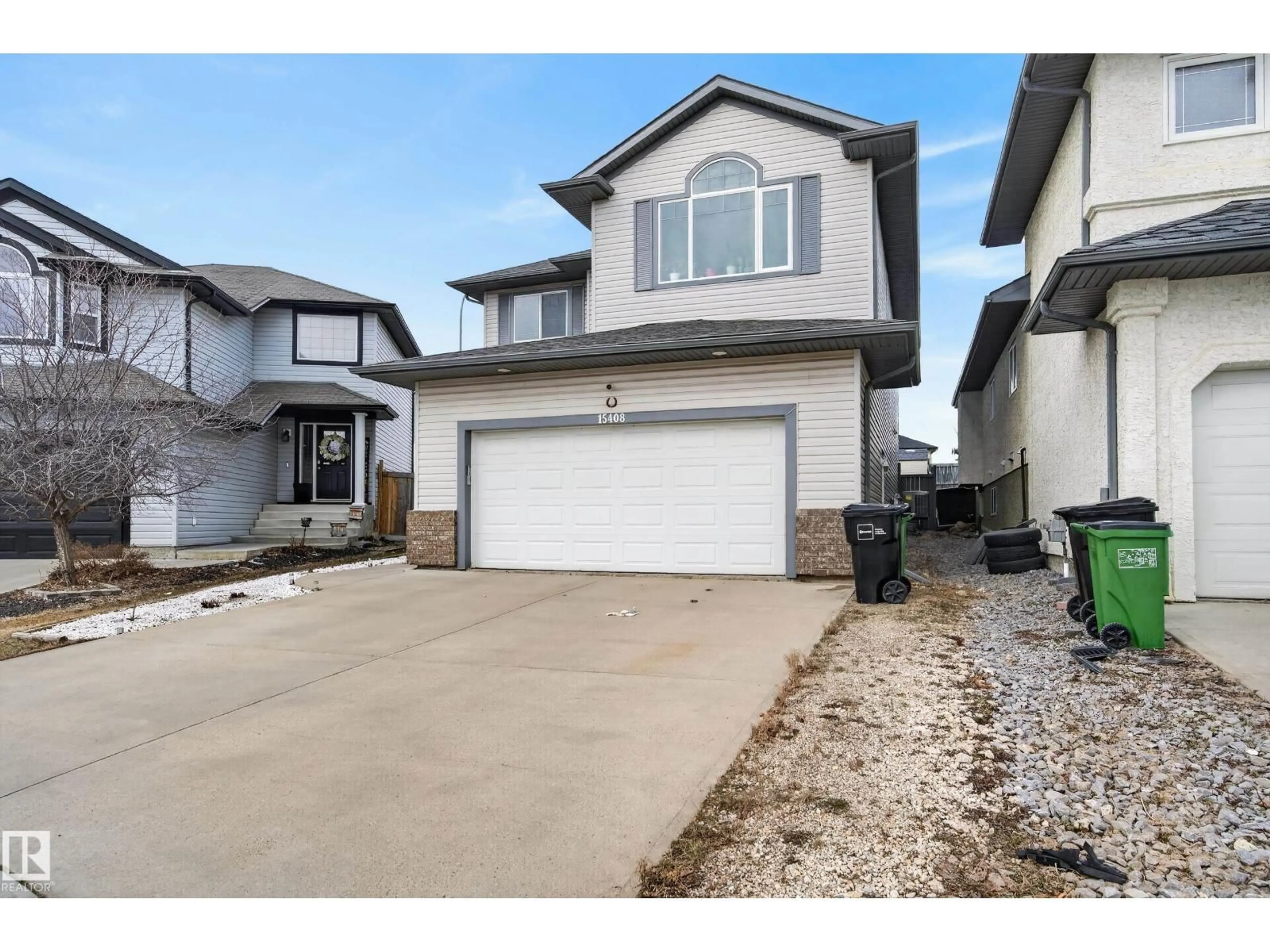 Home with vinyl exterior material, street for 15408 49 ST, Edmonton Alberta T5Y0C1