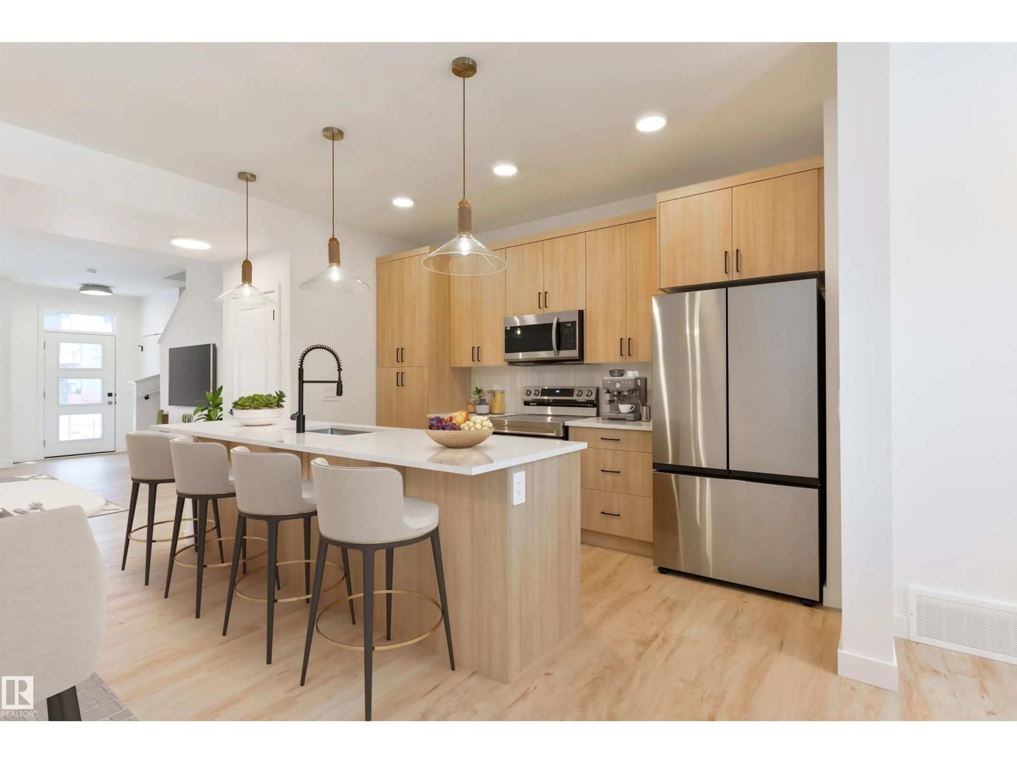 Open concept kitchen, wood/laminate floor for 9 COBBLESTONE GA, Spruce Grove Alberta T7X4E4