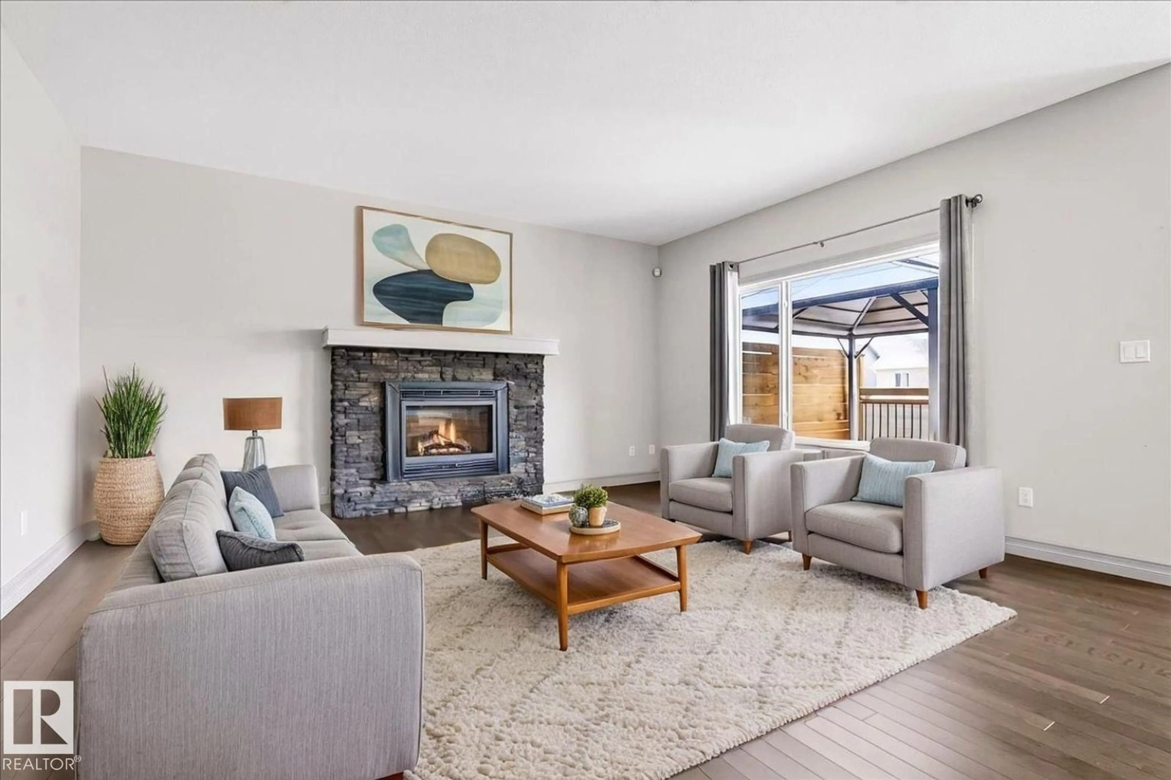 Living room with furniture, unknown for 5912 19 AV, Edmonton Alberta T6X2A2