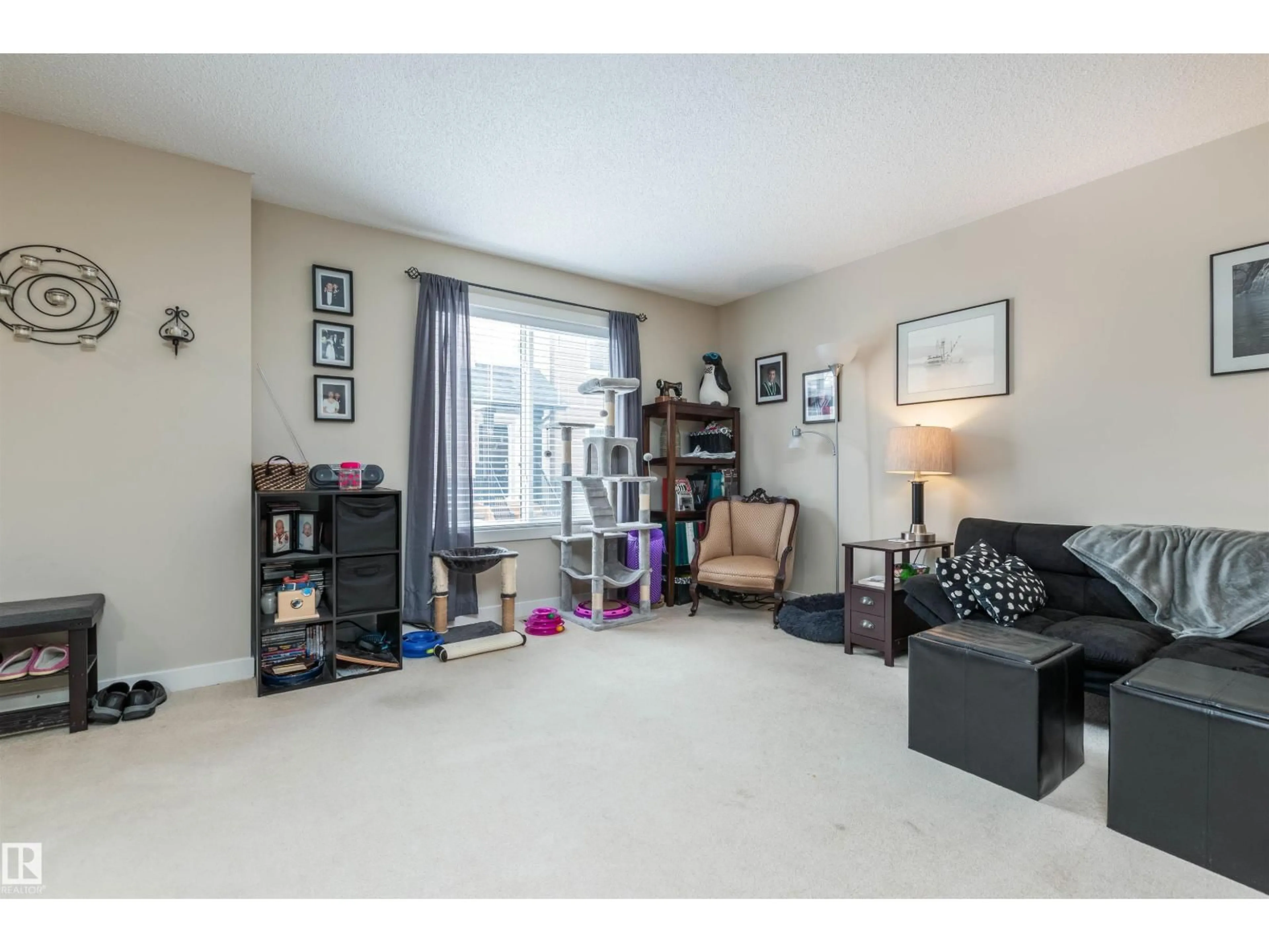 Living room with furniture, unknown for 29 12004 22 AV SW, Edmonton Alberta T6W0T1