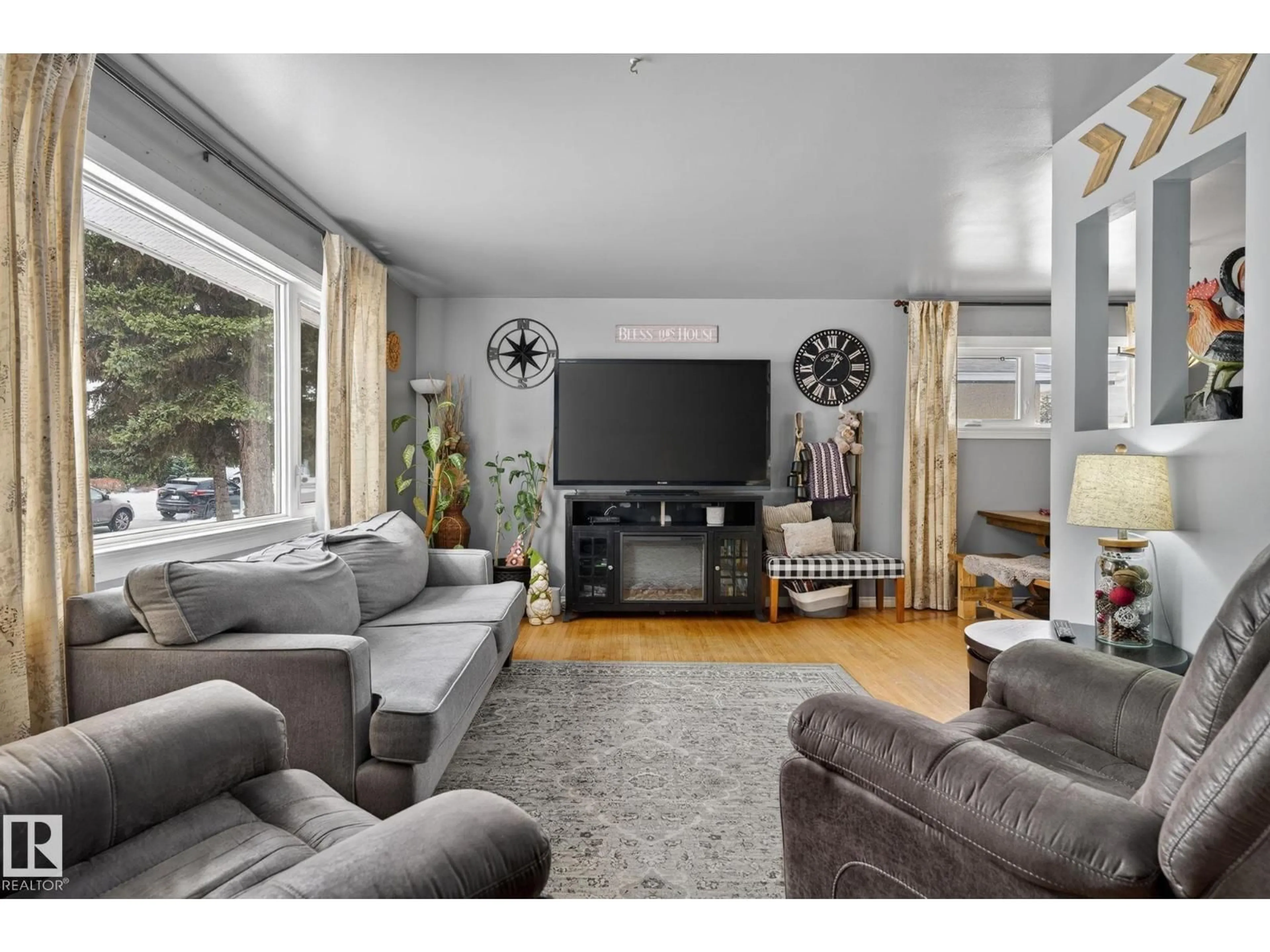 Living room with furniture, unknown for 9112 130 AV, Edmonton Alberta T5E0S2