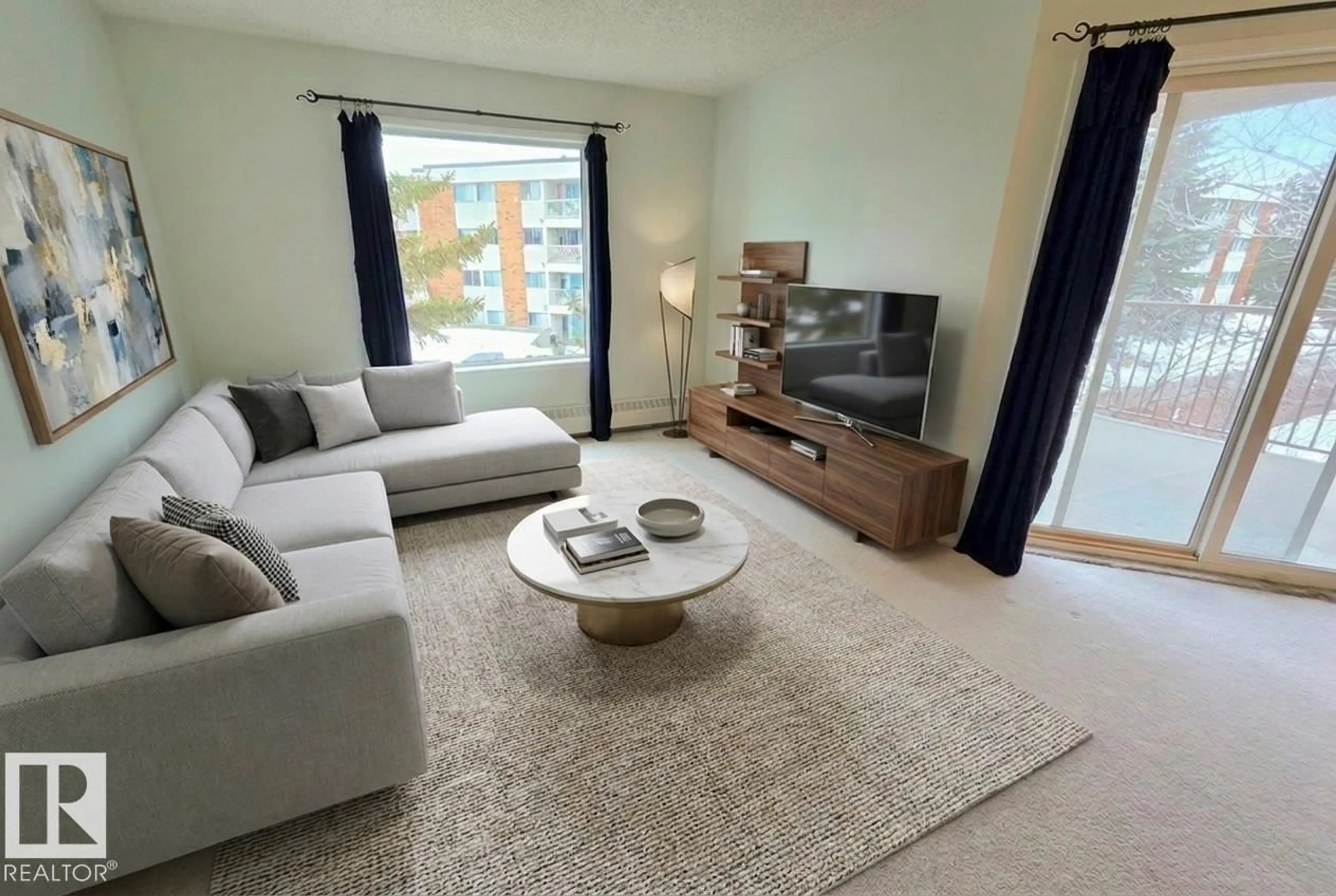 Living room with furniture, unknown for 318 - 17109 67 AV, Edmonton Alberta T5T6E6
