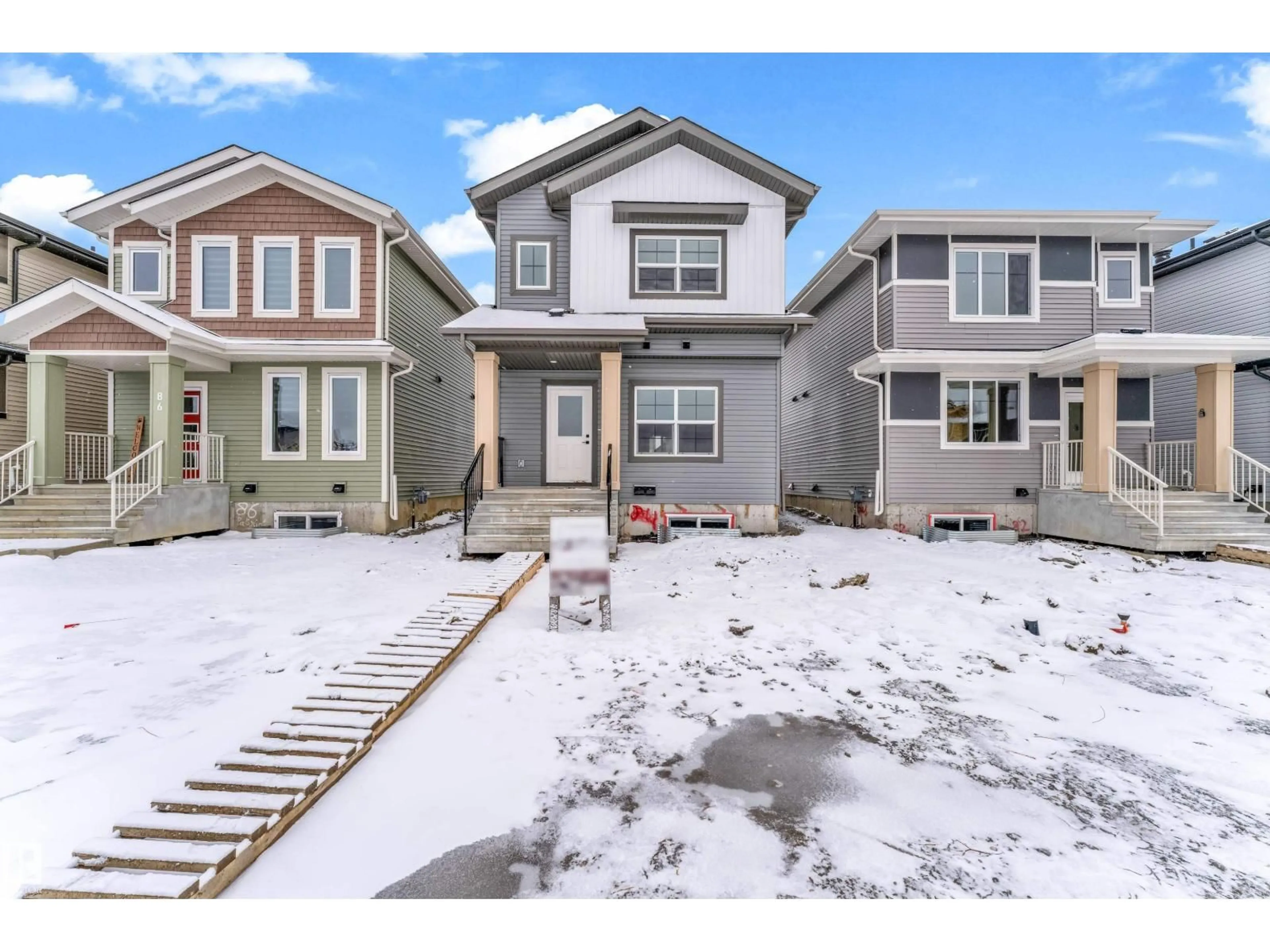 Home with vinyl exterior material, street for 84 PATRIOT WY, Spruce Grove Alberta T7X4E8