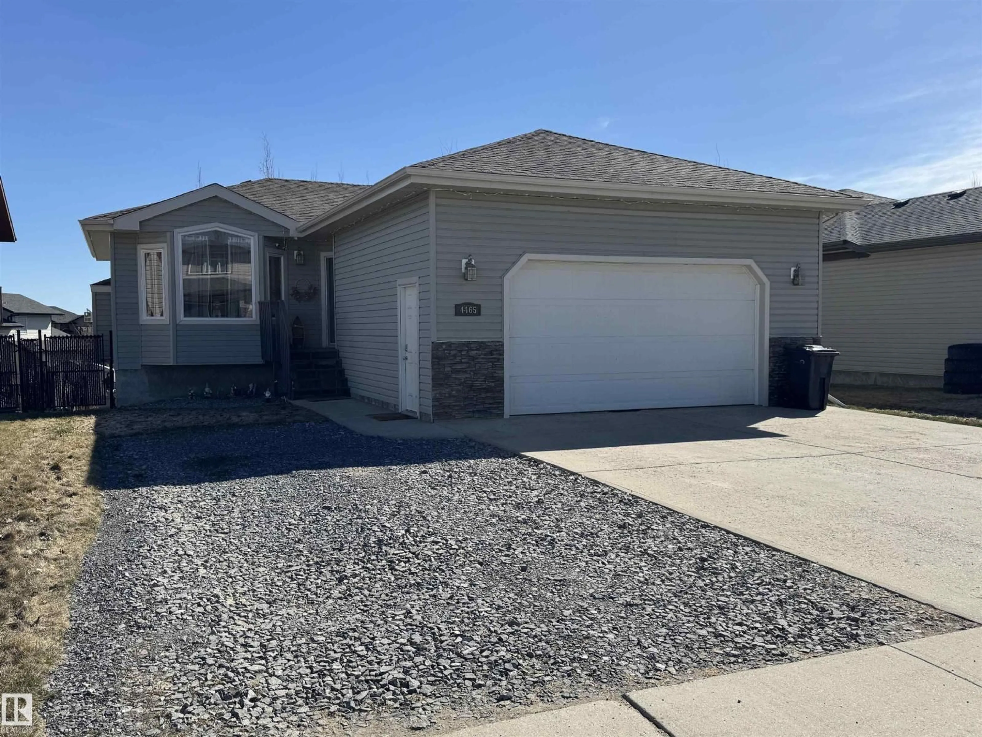 Home with vinyl exterior material, street for 4465 38 ST, Drayton Valley Alberta T7A0A8