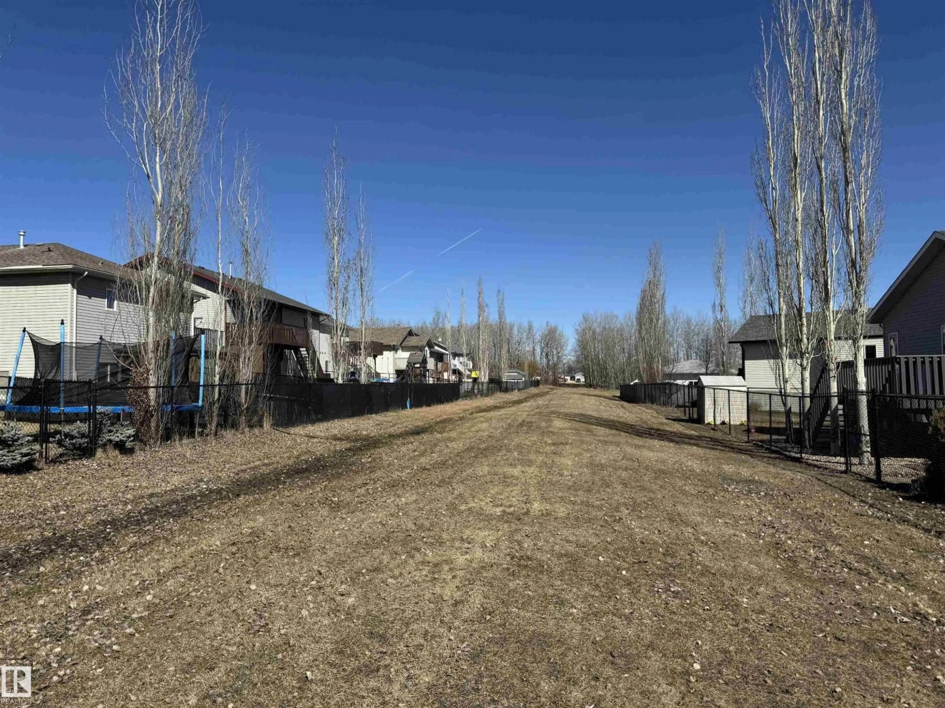 A pic from outside/outdoor area/front of a property/back of a property/a pic from drone, unknown for 4465 38 ST, Drayton Valley Alberta T7A0A8