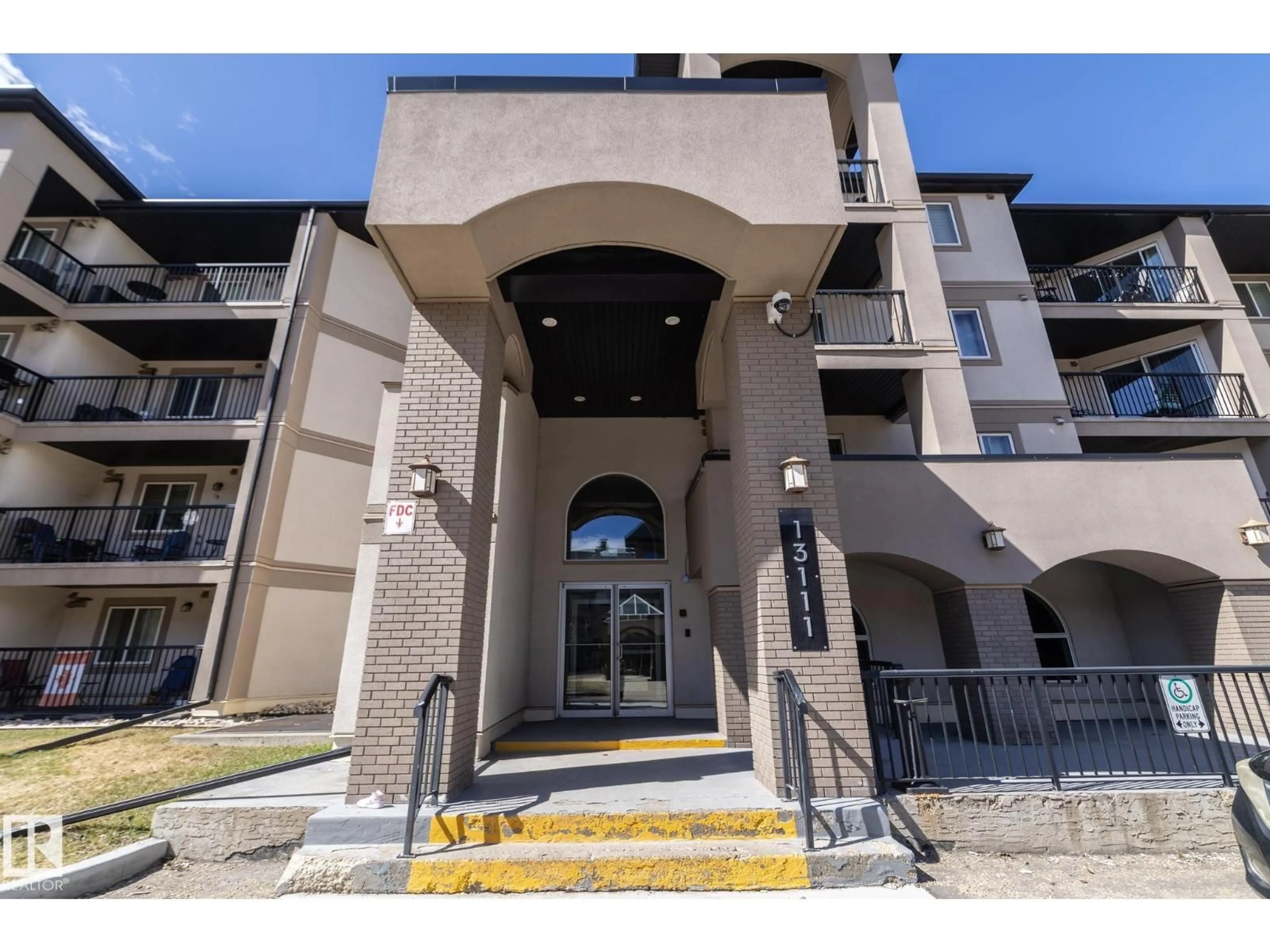 Indoor foyer for #209 - 13111 140 AV, Edmonton Alberta T6V0B1