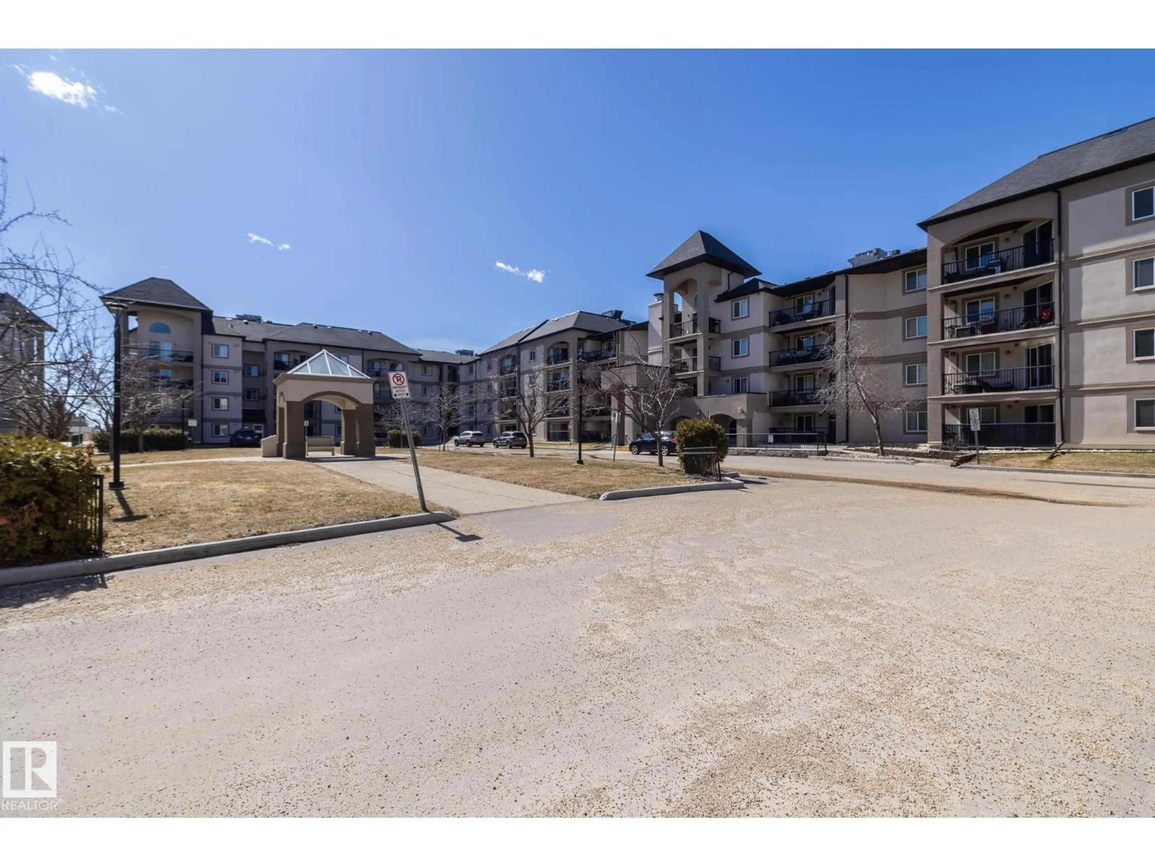A pic from outside/outdoor area/front of a property/back of a property/a pic from drone, water/lake/river/ocean view for #209 - 13111 140 AV, Edmonton Alberta T6V0B1