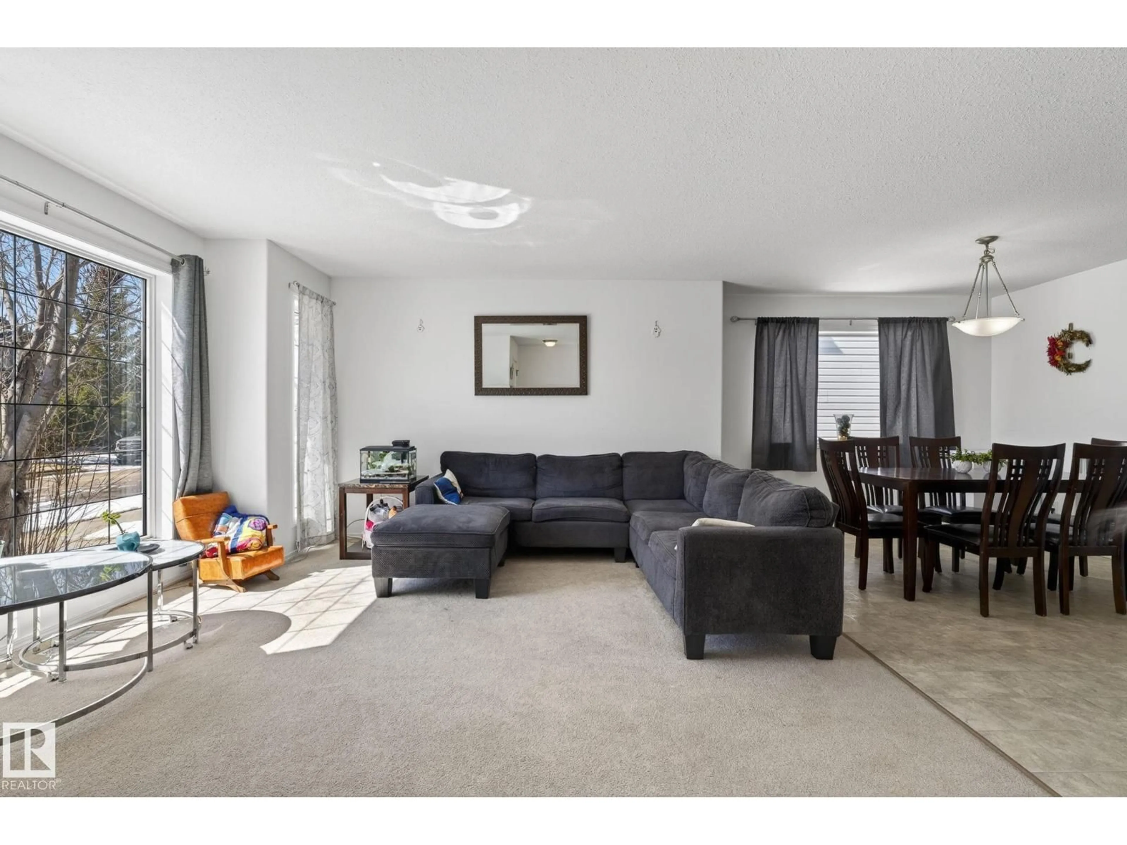 Living room with furniture, unknown for 1904 36 AV, Edmonton Alberta T6T1S9