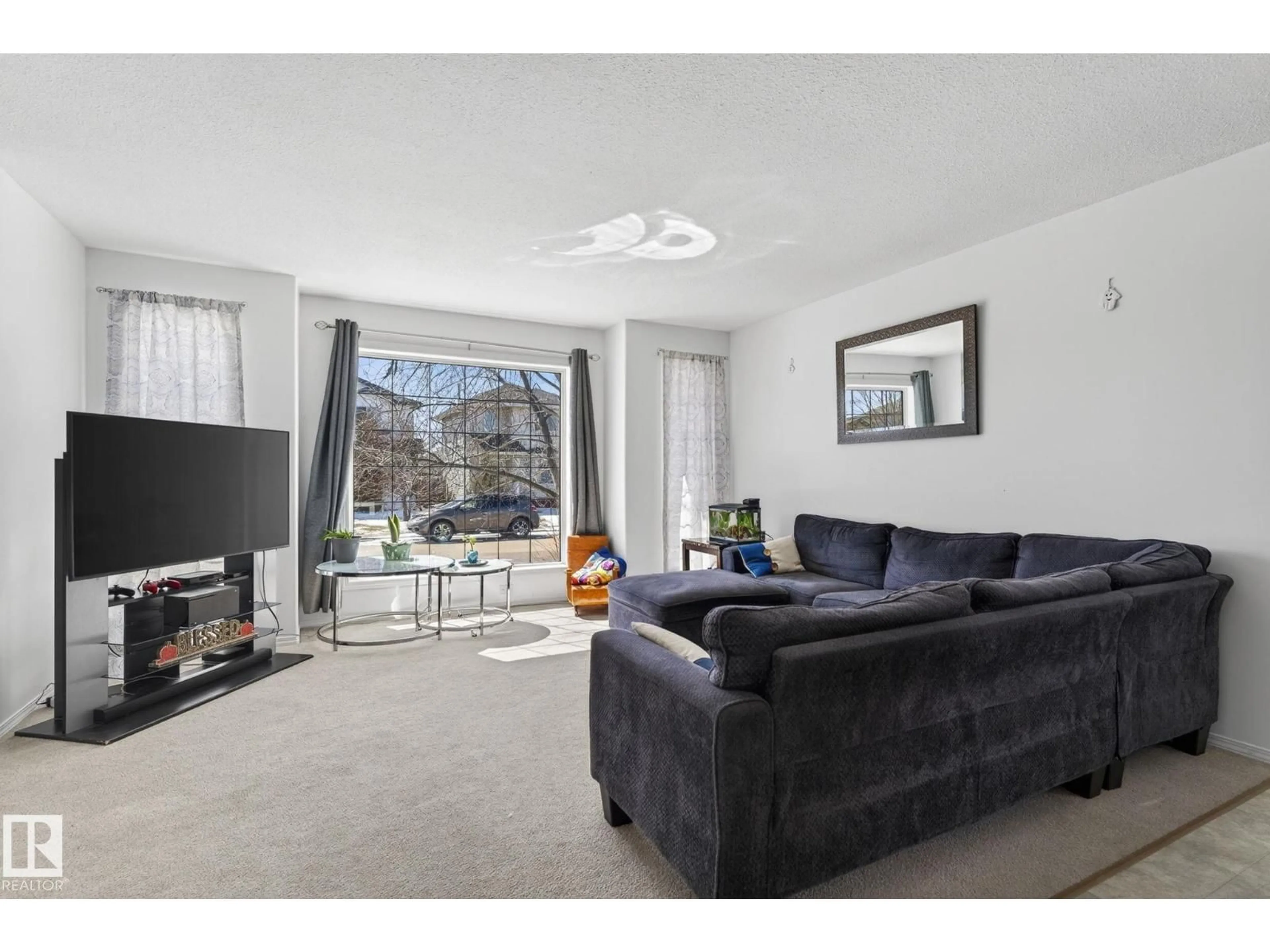 Living room with furniture, unknown for 1904 36 AV, Edmonton Alberta T6T1S9