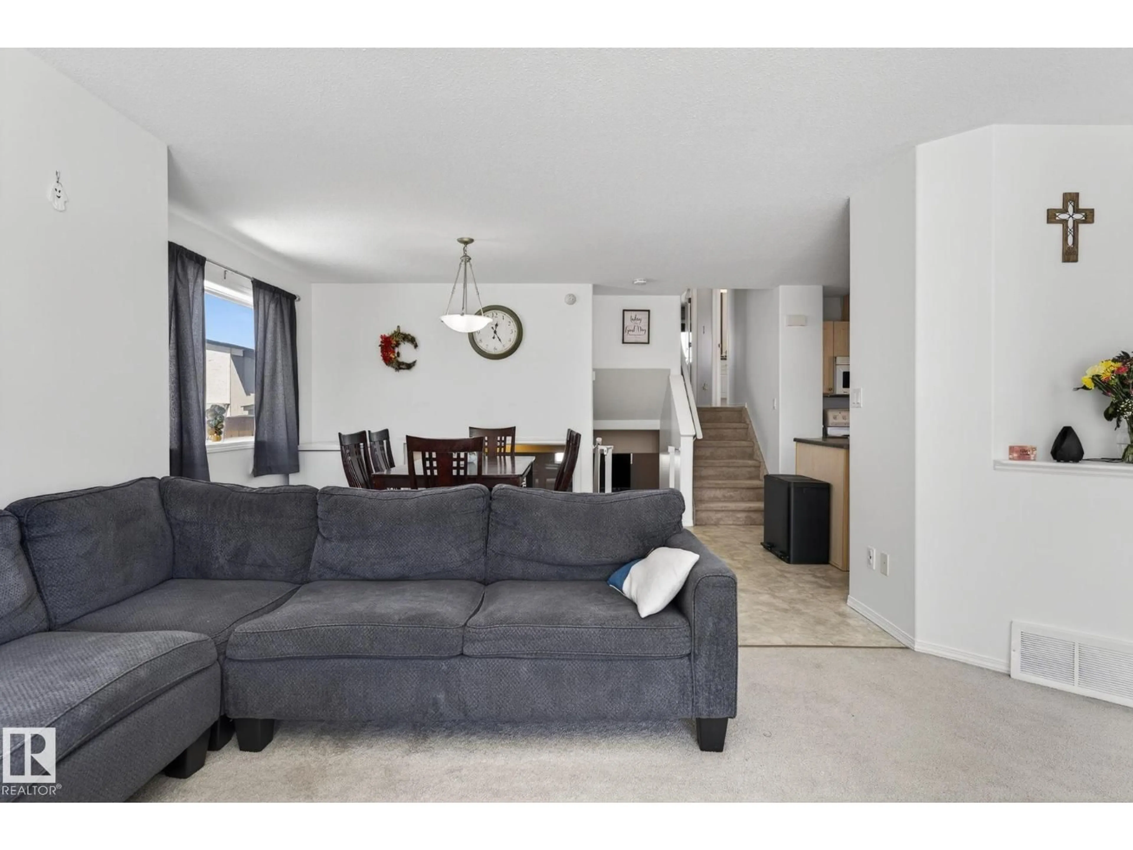 Living room with furniture, unknown for 1904 36 AV, Edmonton Alberta T6T1S9