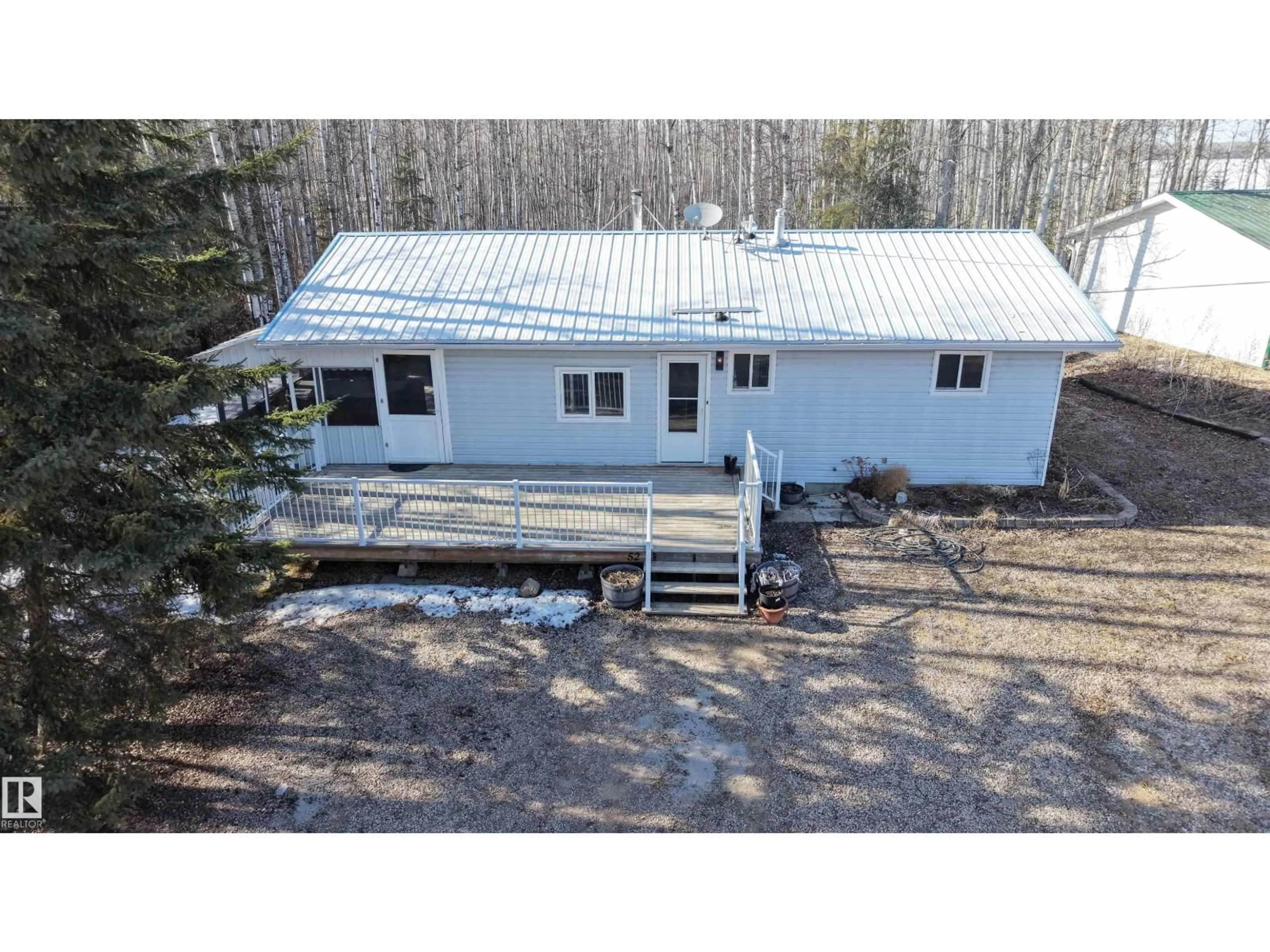 A pic from outside/outdoor area/front of a property/back of a property/a pic from drone, building for 52 5512 TWP 593 A, Rural Barrhead County Alberta T7N1N3