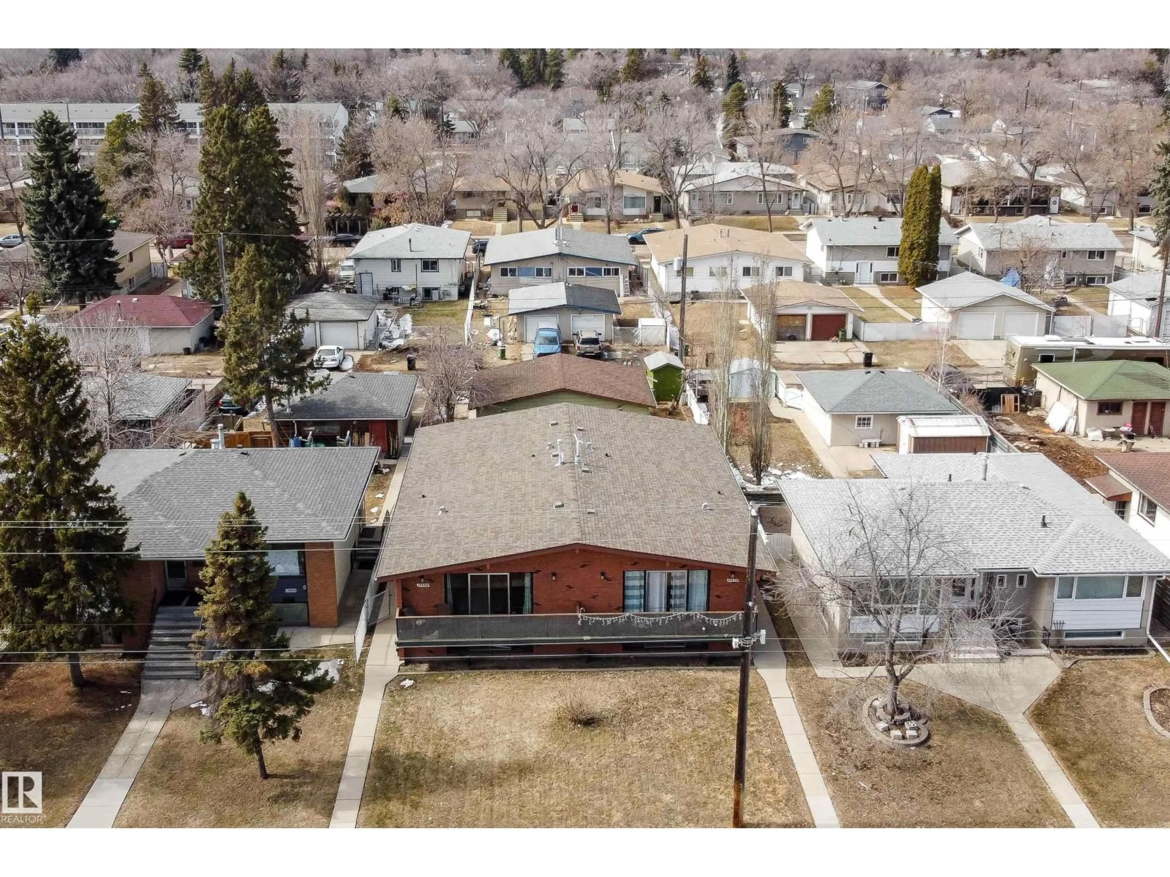 A pic from outside/outdoor area/front of a property/back of a property/a pic from drone, street for NW - 12928 - 12930 101 ST, Edmonton Alberta T5E4E7