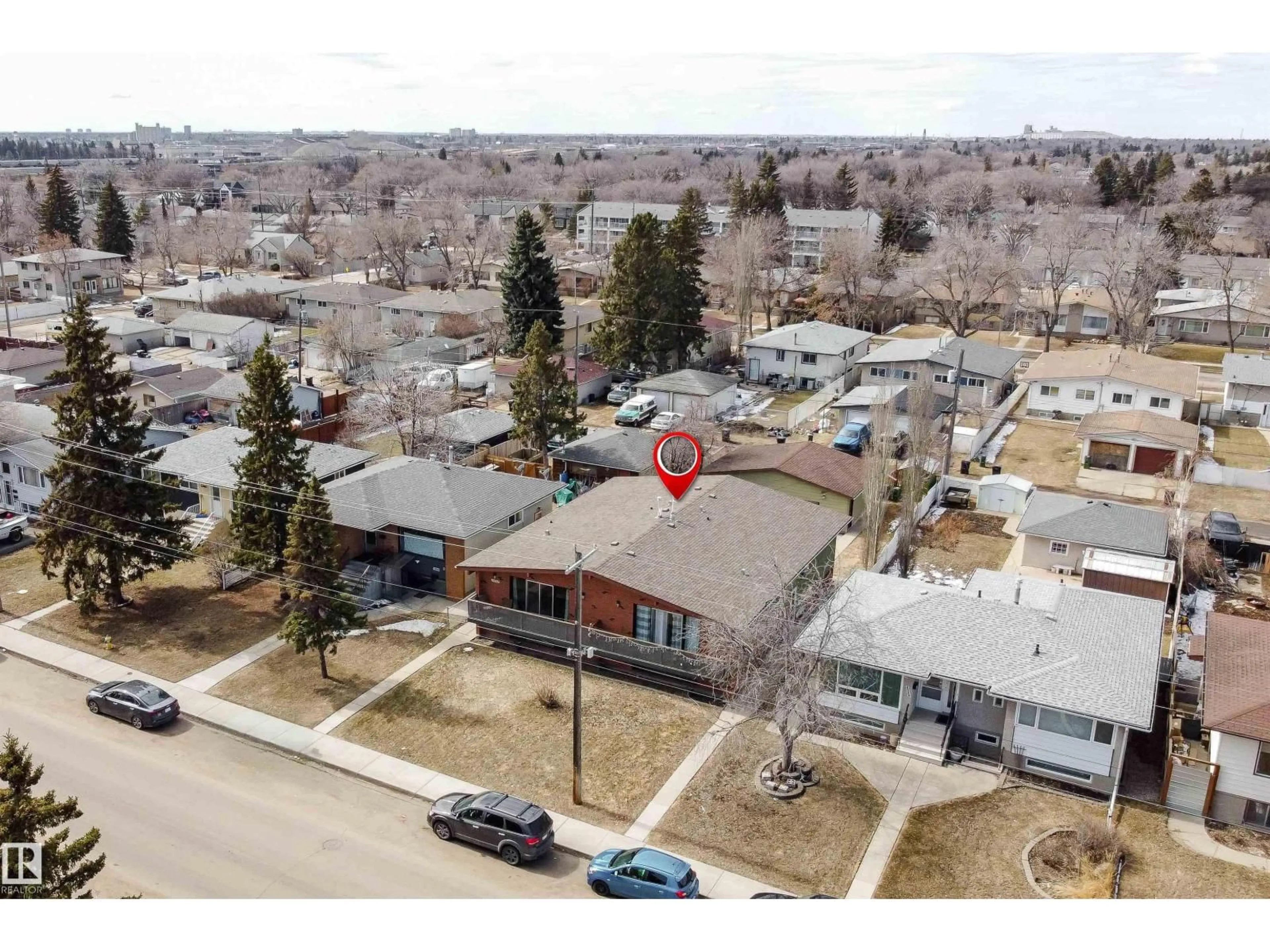 A pic from outside/outdoor area/front of a property/back of a property/a pic from drone, street for NW - 12928 - 12930 101 ST, Edmonton Alberta T5E4E7