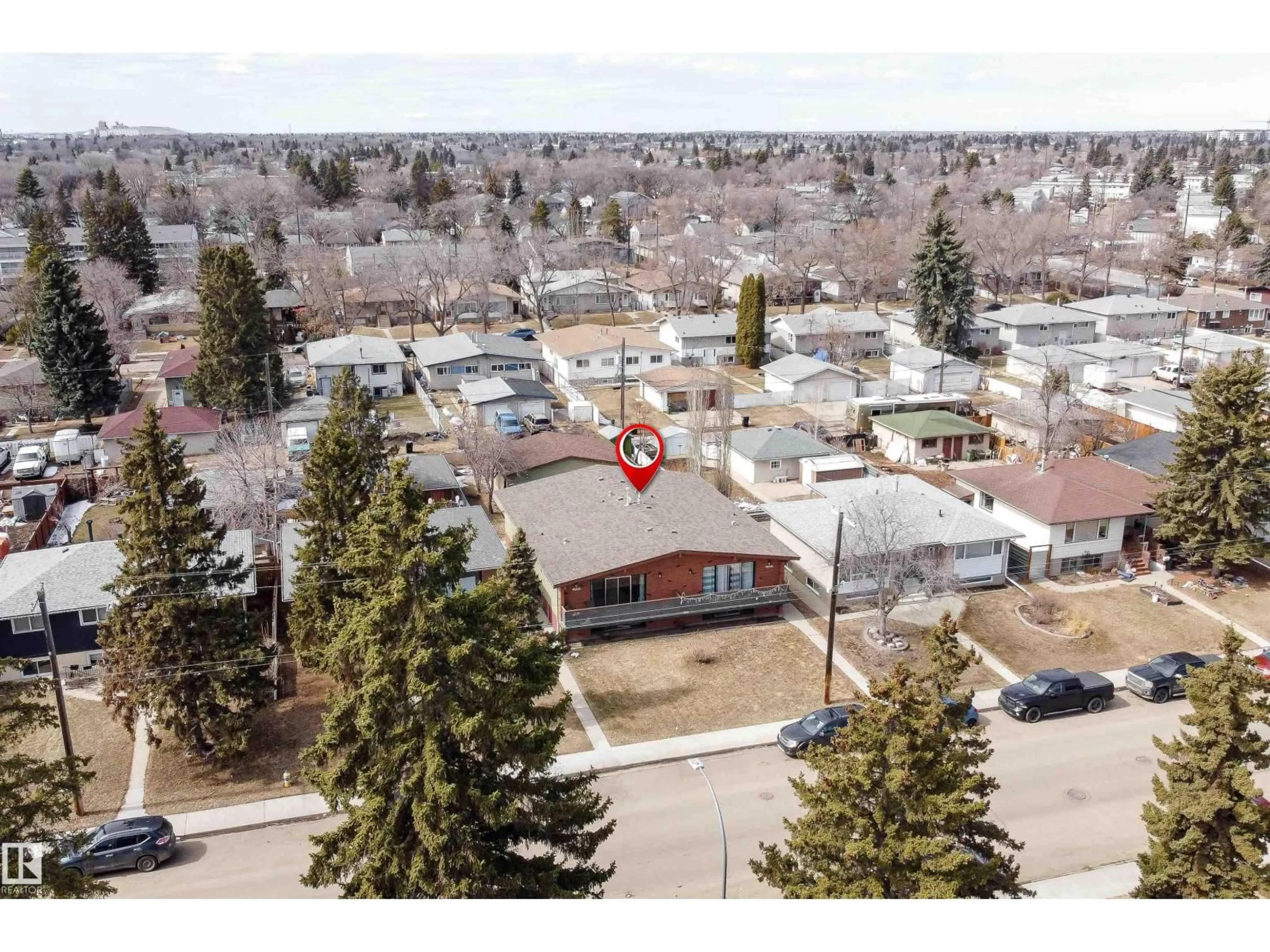 A pic from outside/outdoor area/front of a property/back of a property/a pic from drone, street for NW - 12928 - 12930 101 ST, Edmonton Alberta T5E4E7