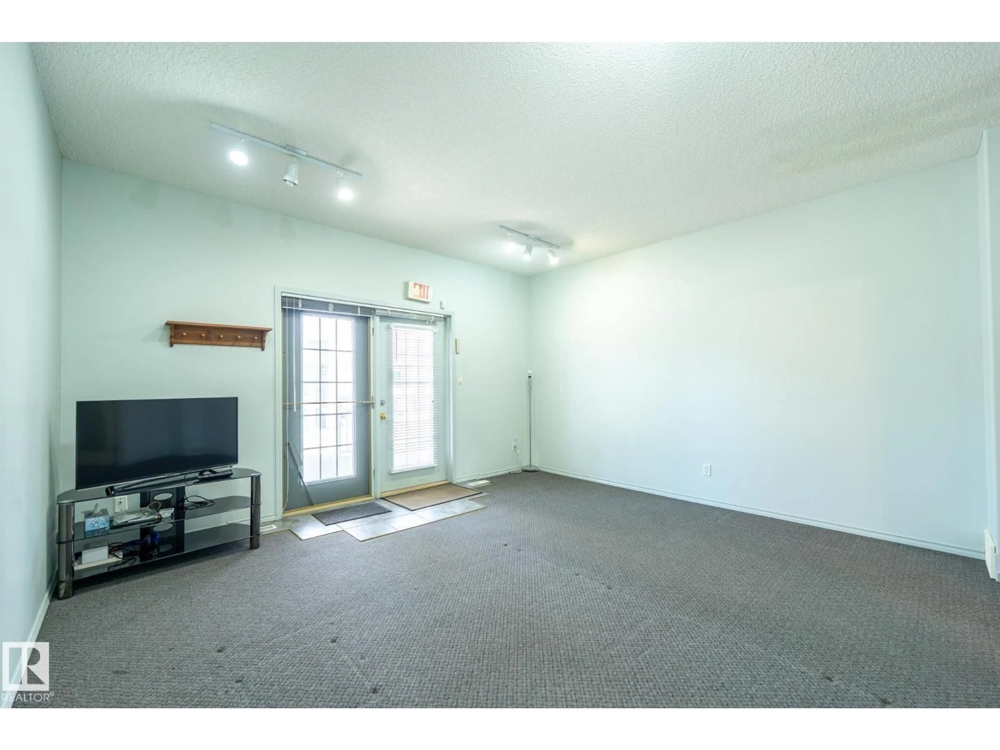 A pic of a room for 3 - 10235 111 ST, Edmonton Alberta T5K1V5